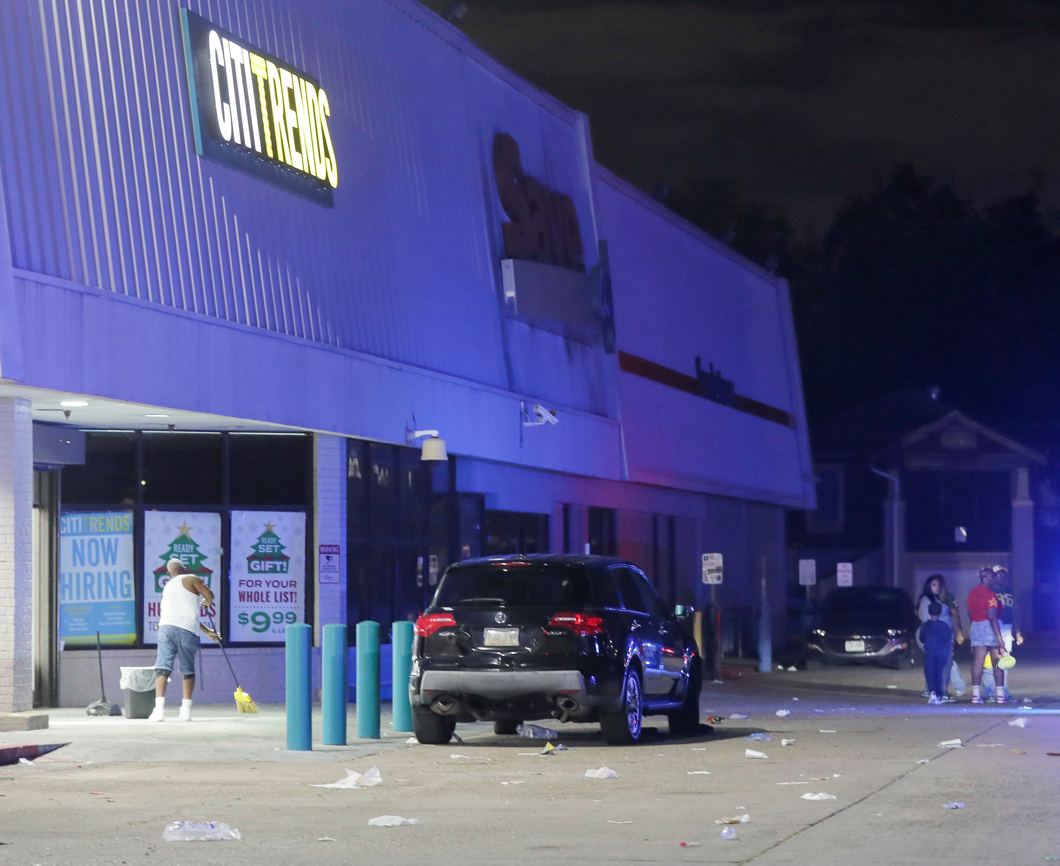 Scene at the Save O Lot parking lot where several people were shot