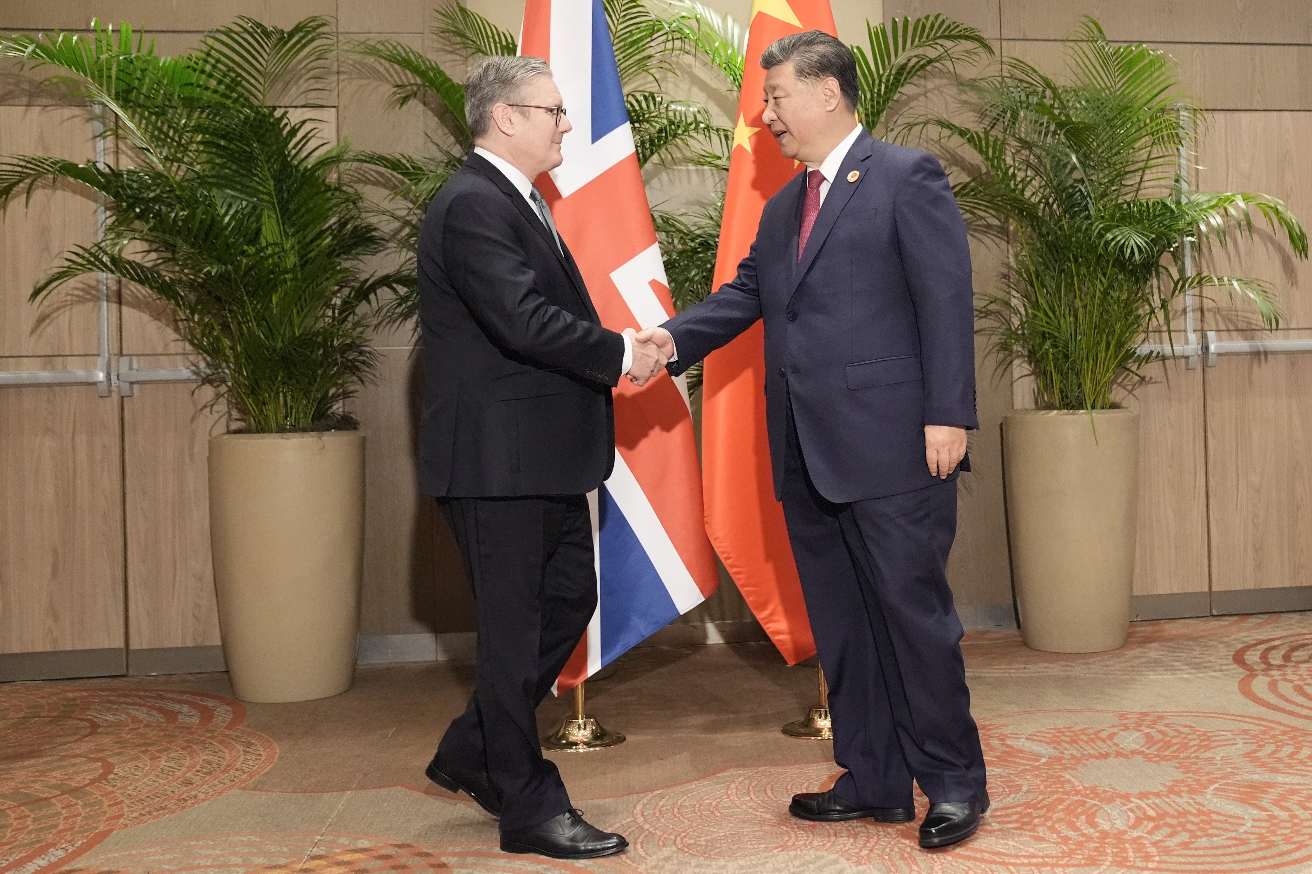 Sir Keir Starmer shakes hands with President Xi Jinping (Stefan Rousseau/PA)