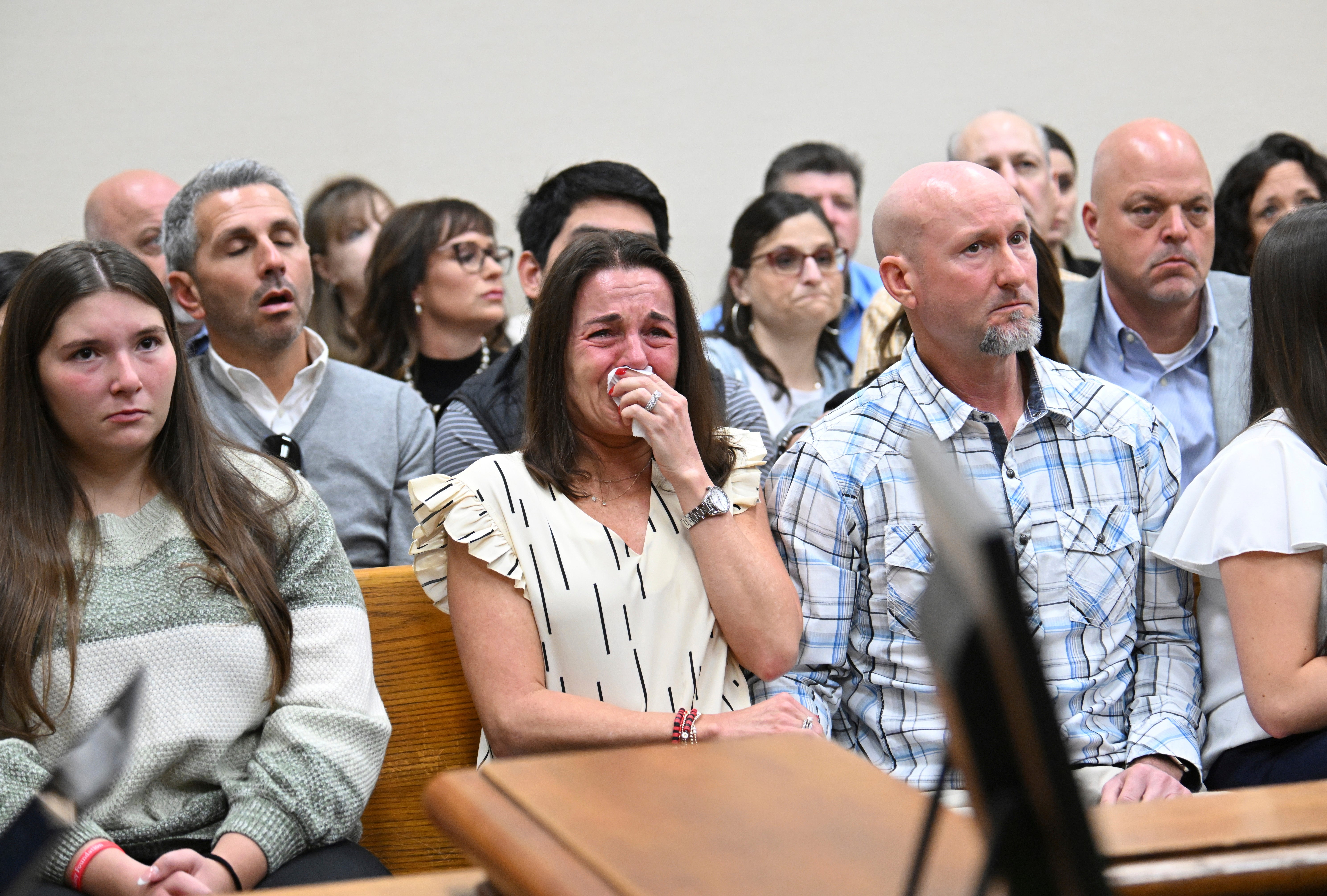 Allyson Phillips, second from left, mother of Laken Riley, cries in court listening to testimony of her daughter’s final moments