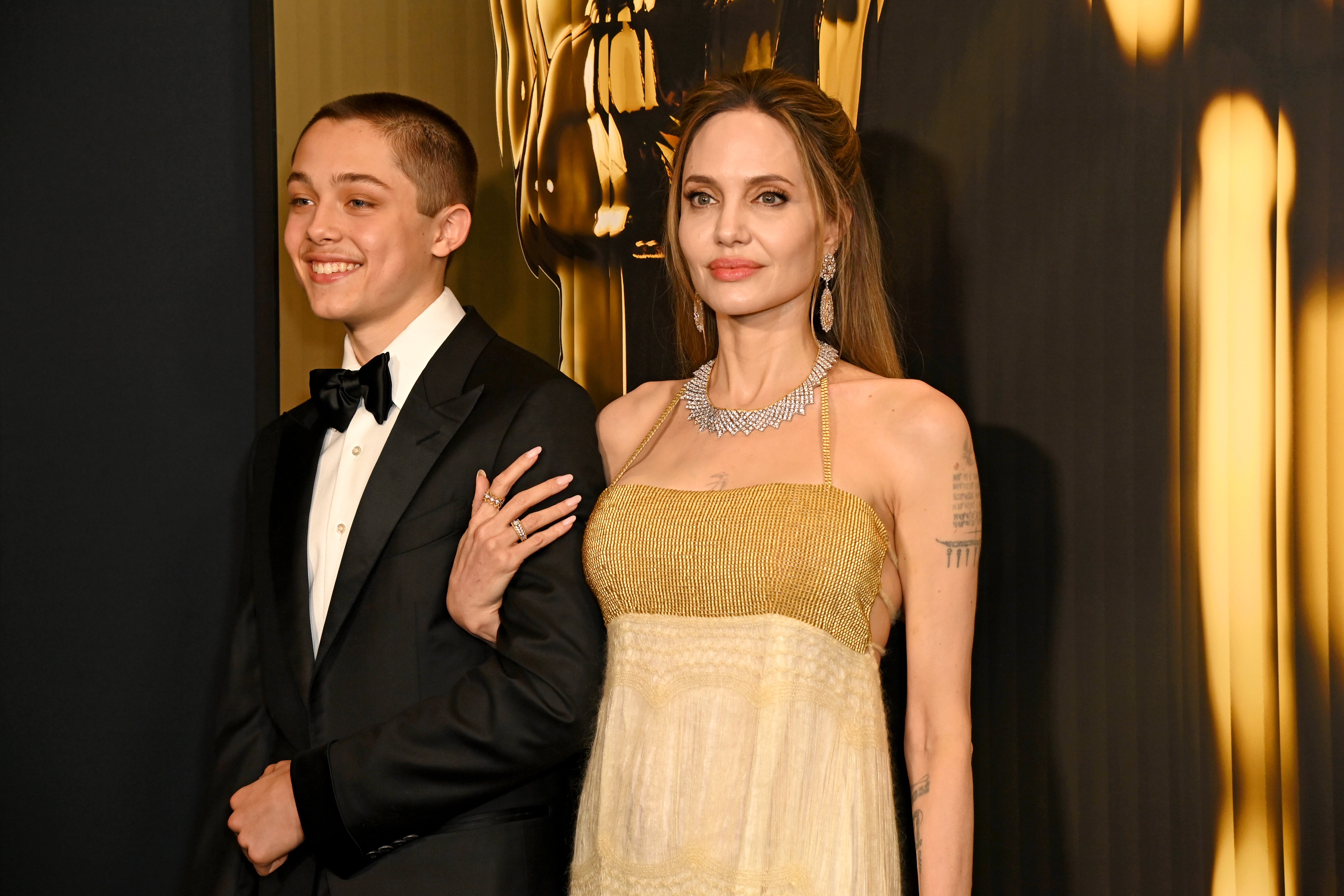 Knox Jolie-Pitt and Angelina Jolie attend the 2024 Governors Awards