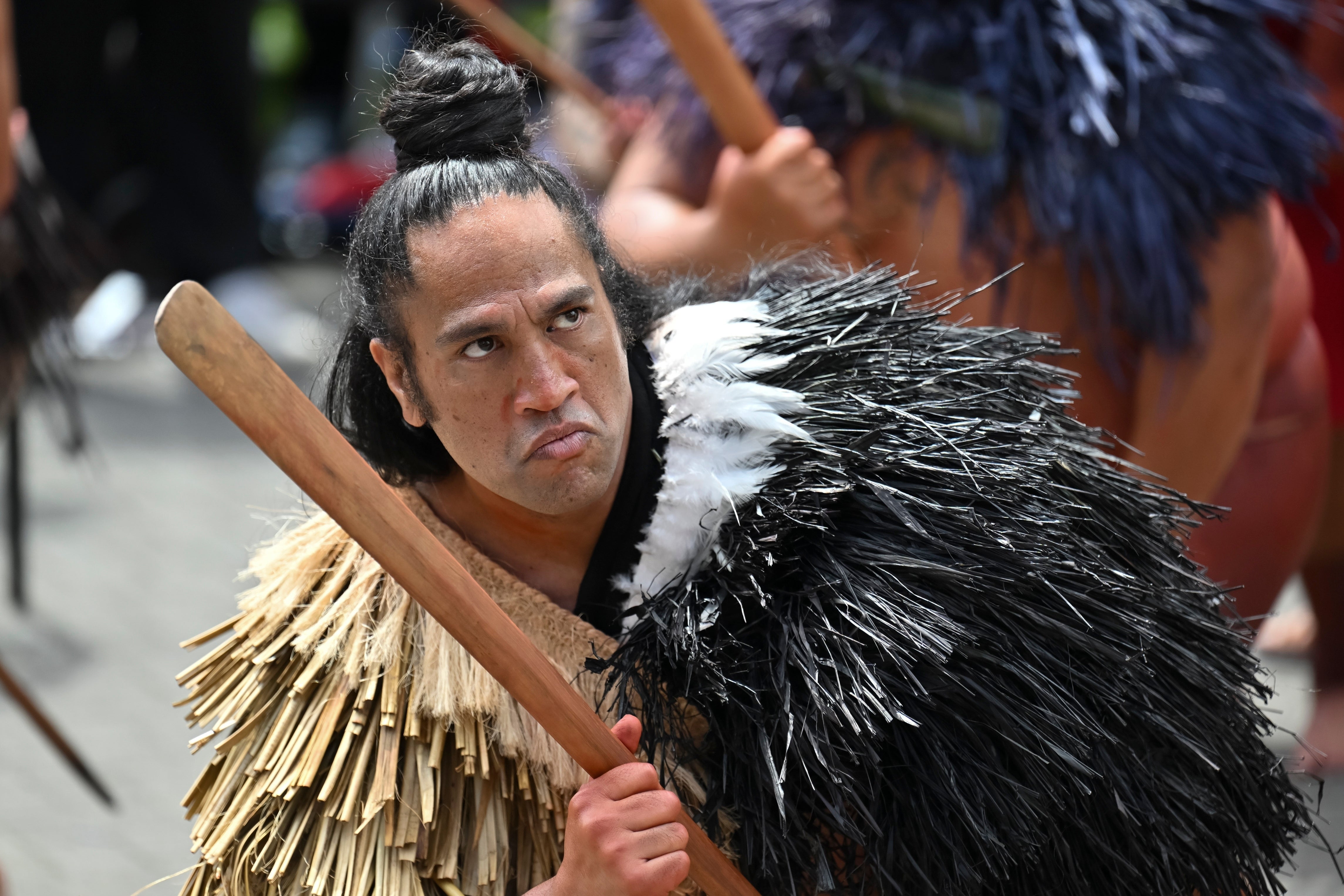 A Maori reacts outside New Zealand’s parliament to protest against a proposed law that would redefine the country's founding agreement between Indigenous Māori and the British Crown in Wellington on 19 November 2024