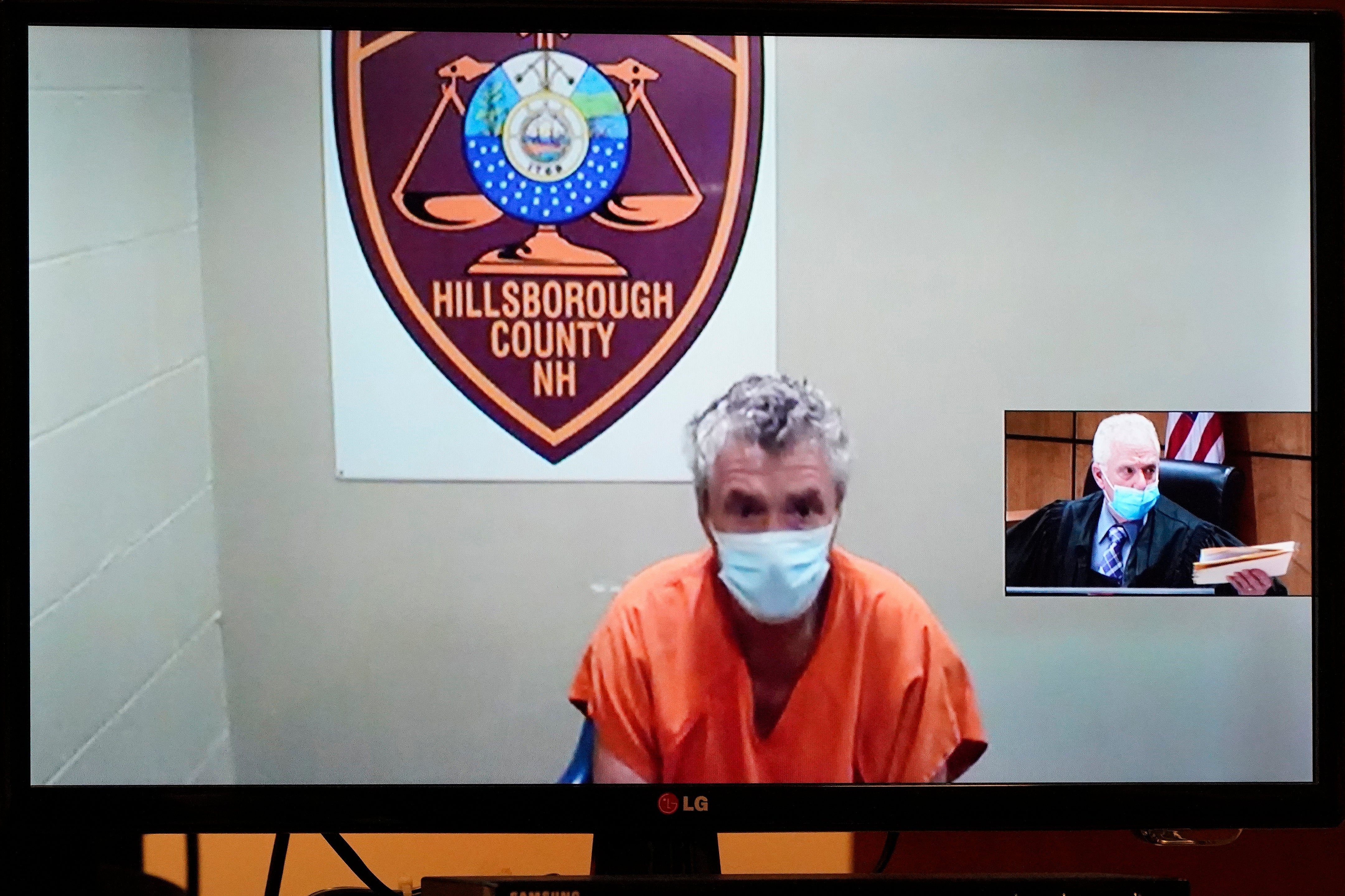 Bradley Asbury is arraigned via video as Judge William Lyons presides, at right, at Manchester, N.H.