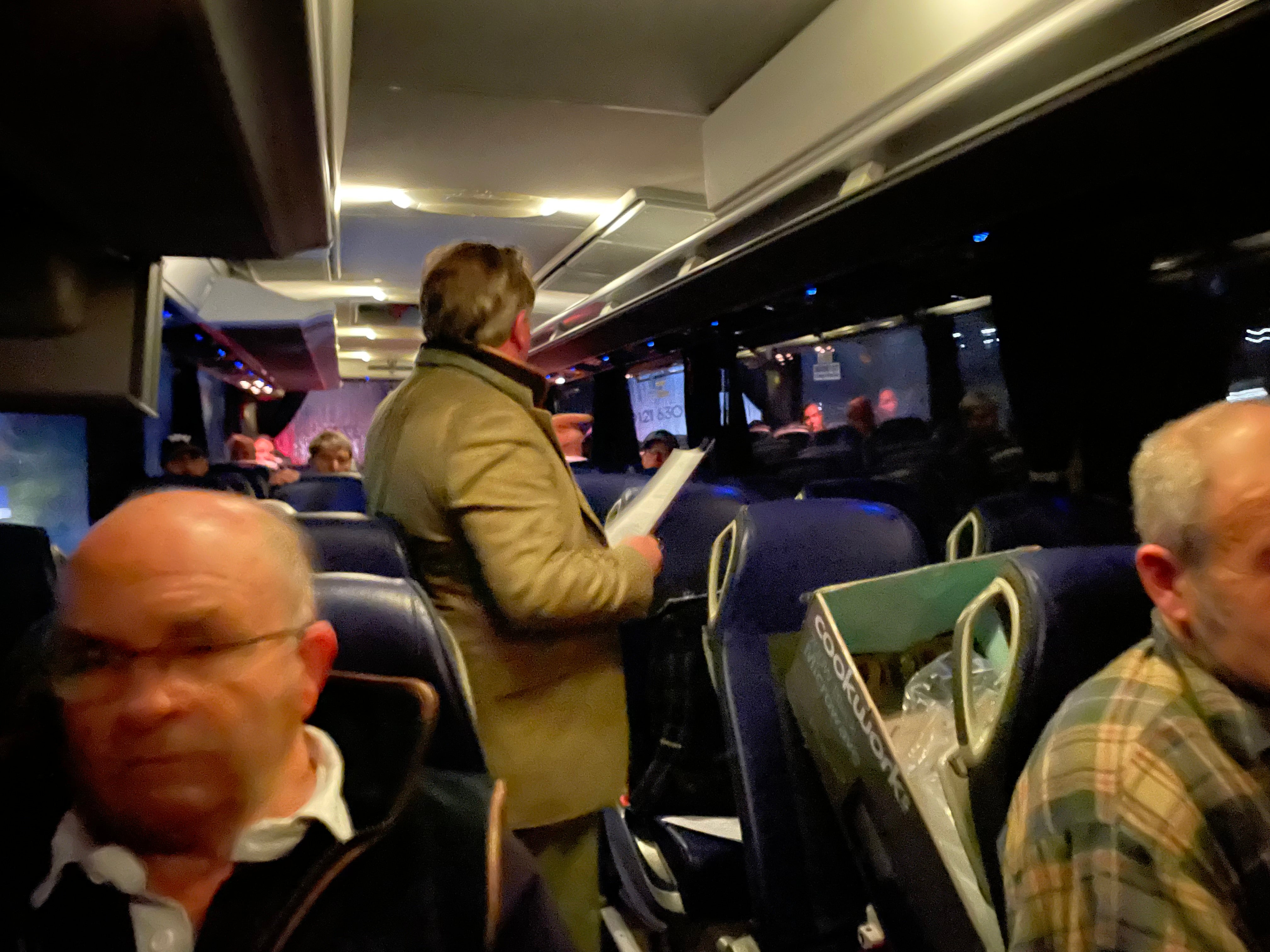 Chris Farr addresses farmers on the coach from Cirencester to London