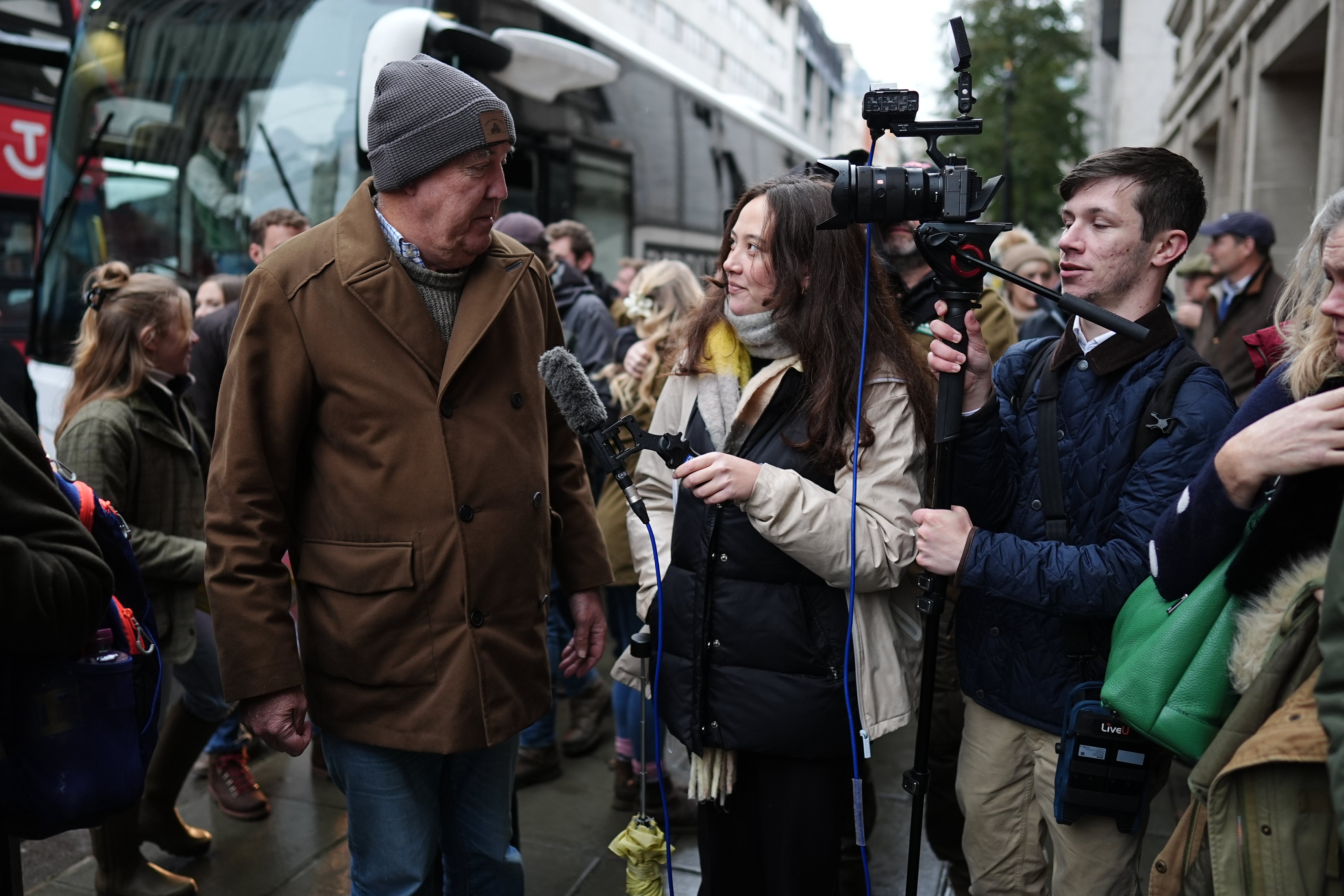 He was seen talking to journalists and broadcasters ahead of the march