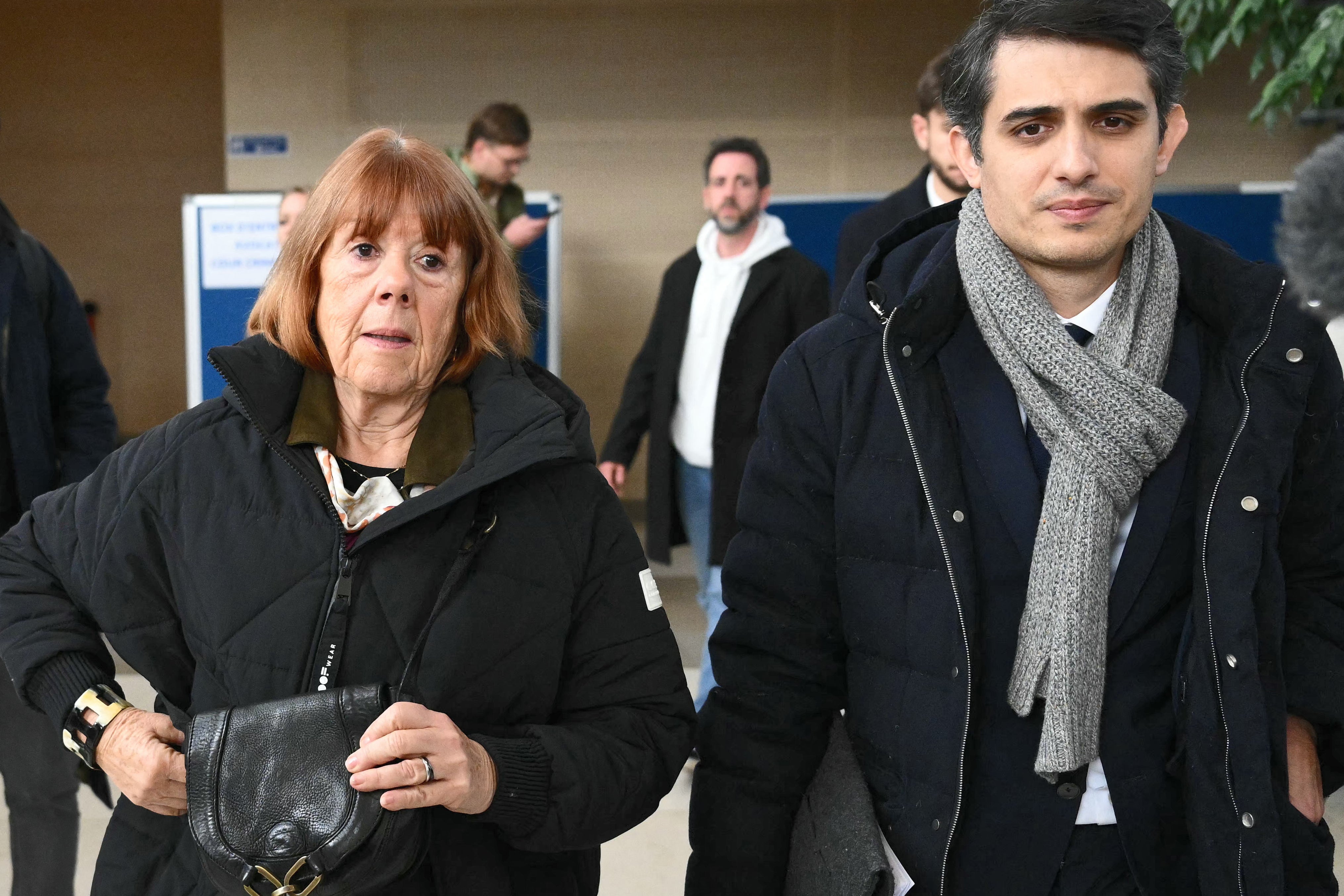 Gisele Pelicot (left) arrives with her lawyer Stephane Babonneau at the courthouse for the trial on Tuesday
