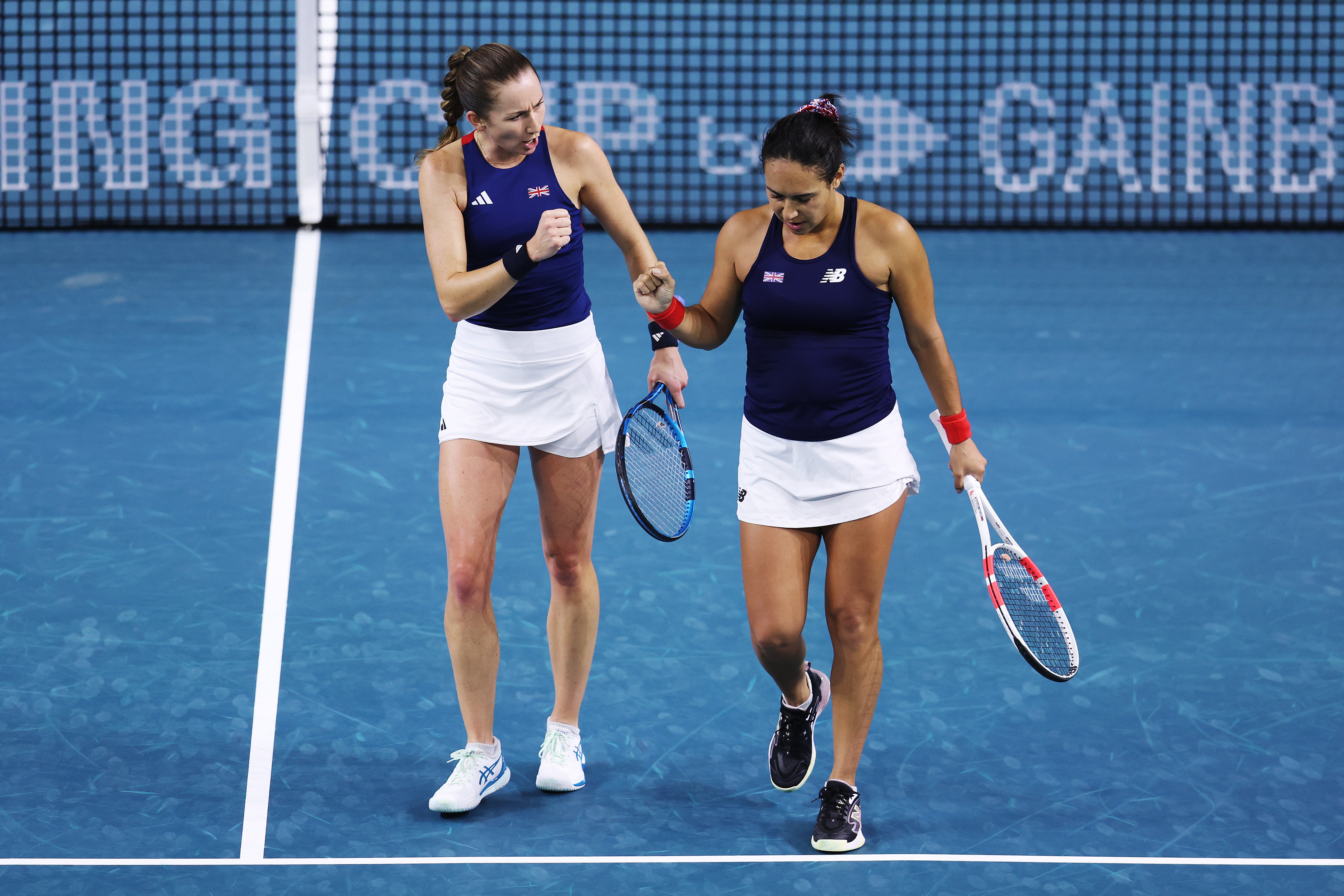 Olivia Nicholls and Heather Watson were beaten in straight sets in the doubles