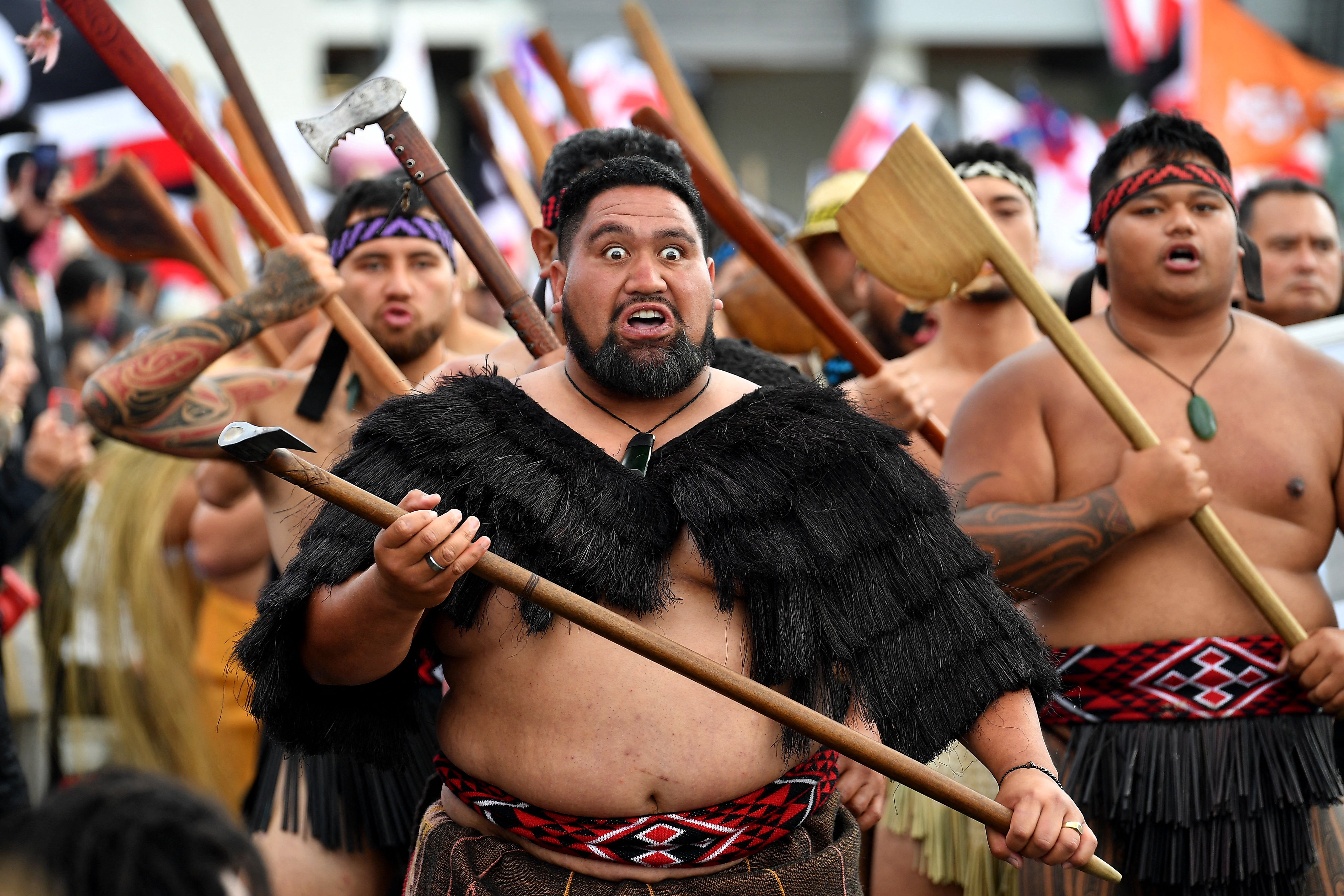 Members of the Maori community march in a protest rally in Wellington