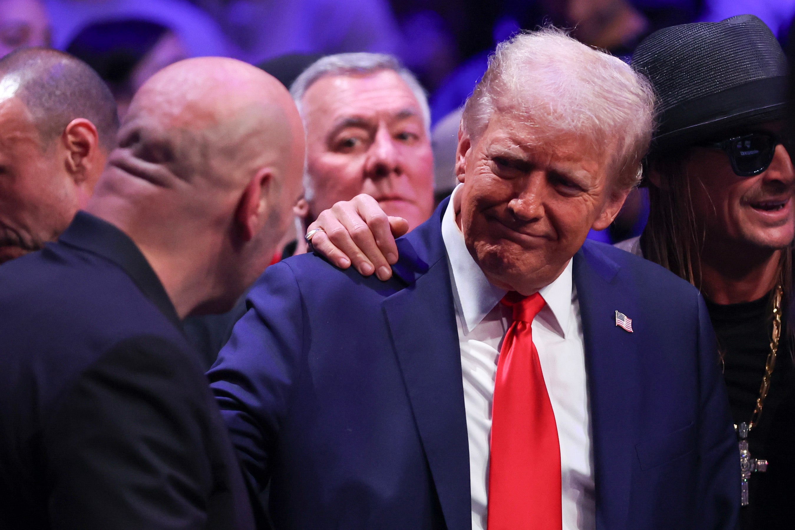 Trump talks with Dana White during the UFC 309 event at Madison Square Garden on November 16, 2024 in New York City. Trump’s approval rating stands at 54 percent compared to 42 percent for Biden