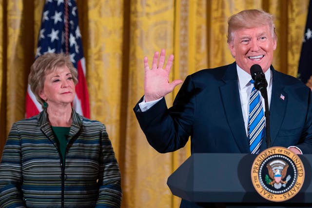 <p>US President Donald Trump speaks with Ivanka Trump and SBA Administrator Linda McMahon (L) during an event with small businesses at the White House in Washington, DC, on August 1, 2017</p>