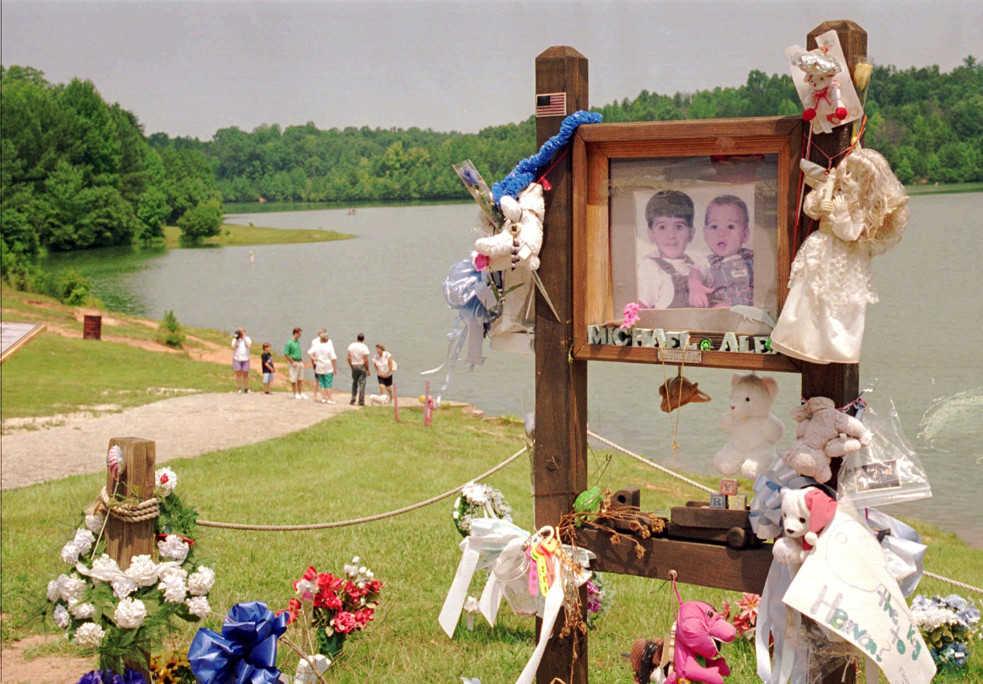 In a July 9, 1995 file photo, visitors walk down the ramp where Alex and Michael Smith were drowned