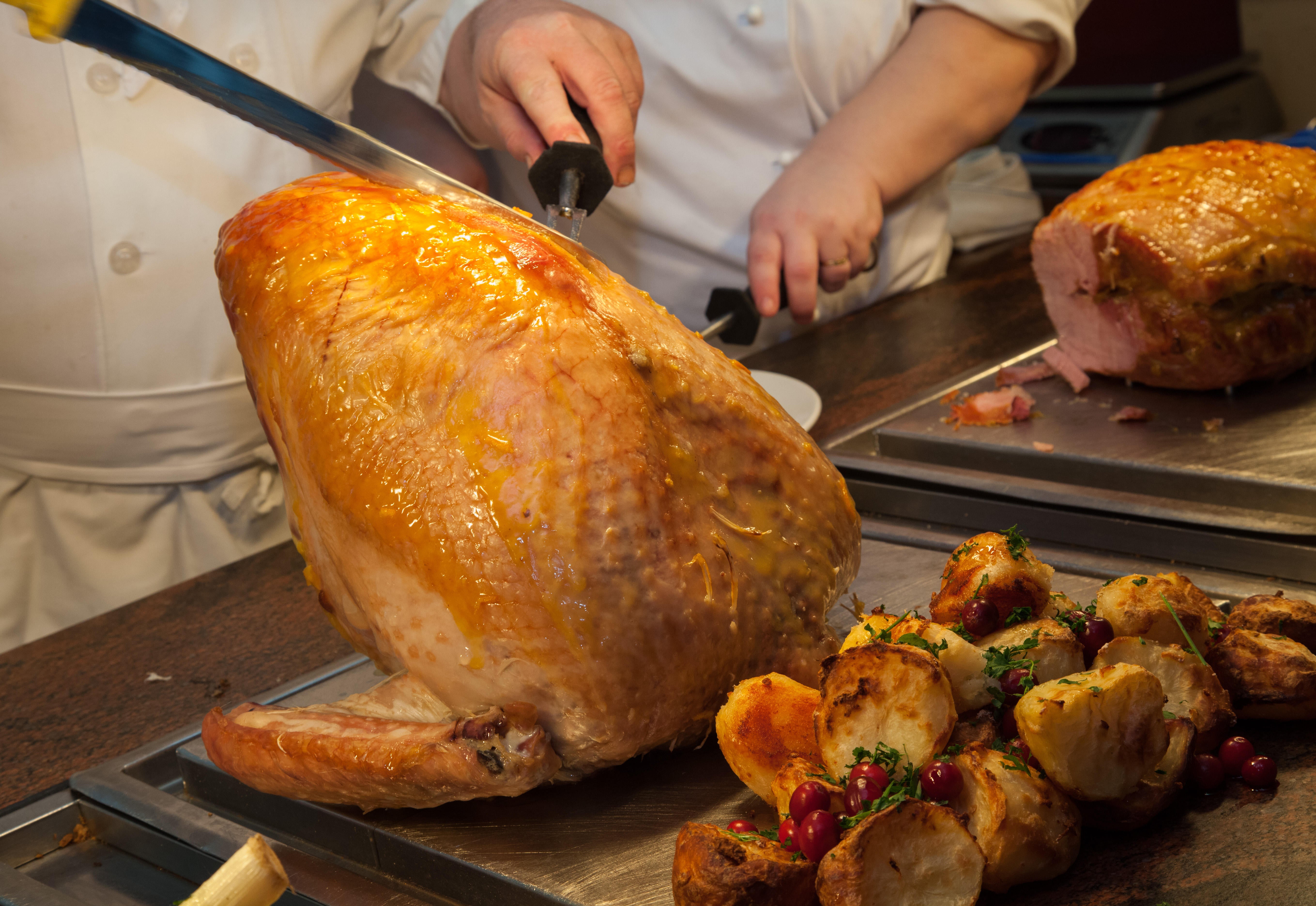 Carving the turkey at the Christmas table is one of those key moments on the big day