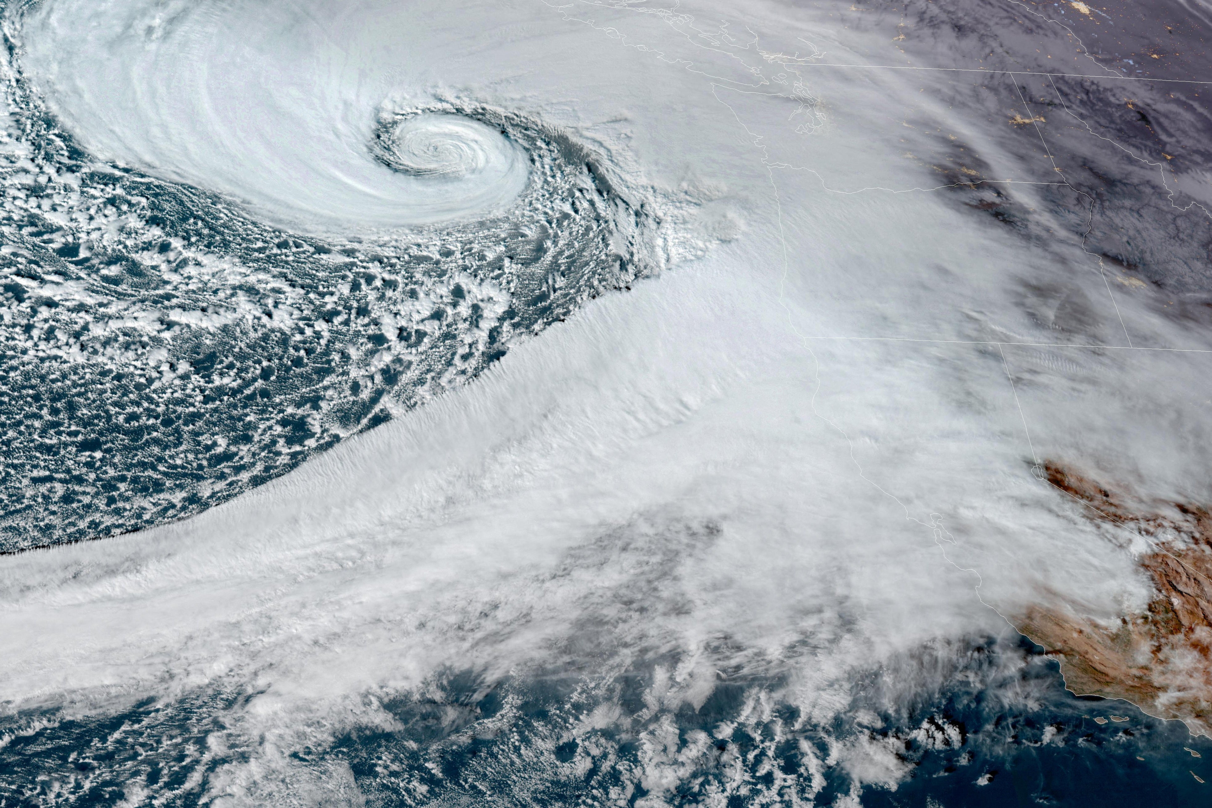 Low pressure storm system known as a ‘bomb cyclone’ forms off the coast of the US Pacific Northwest on Tuesday