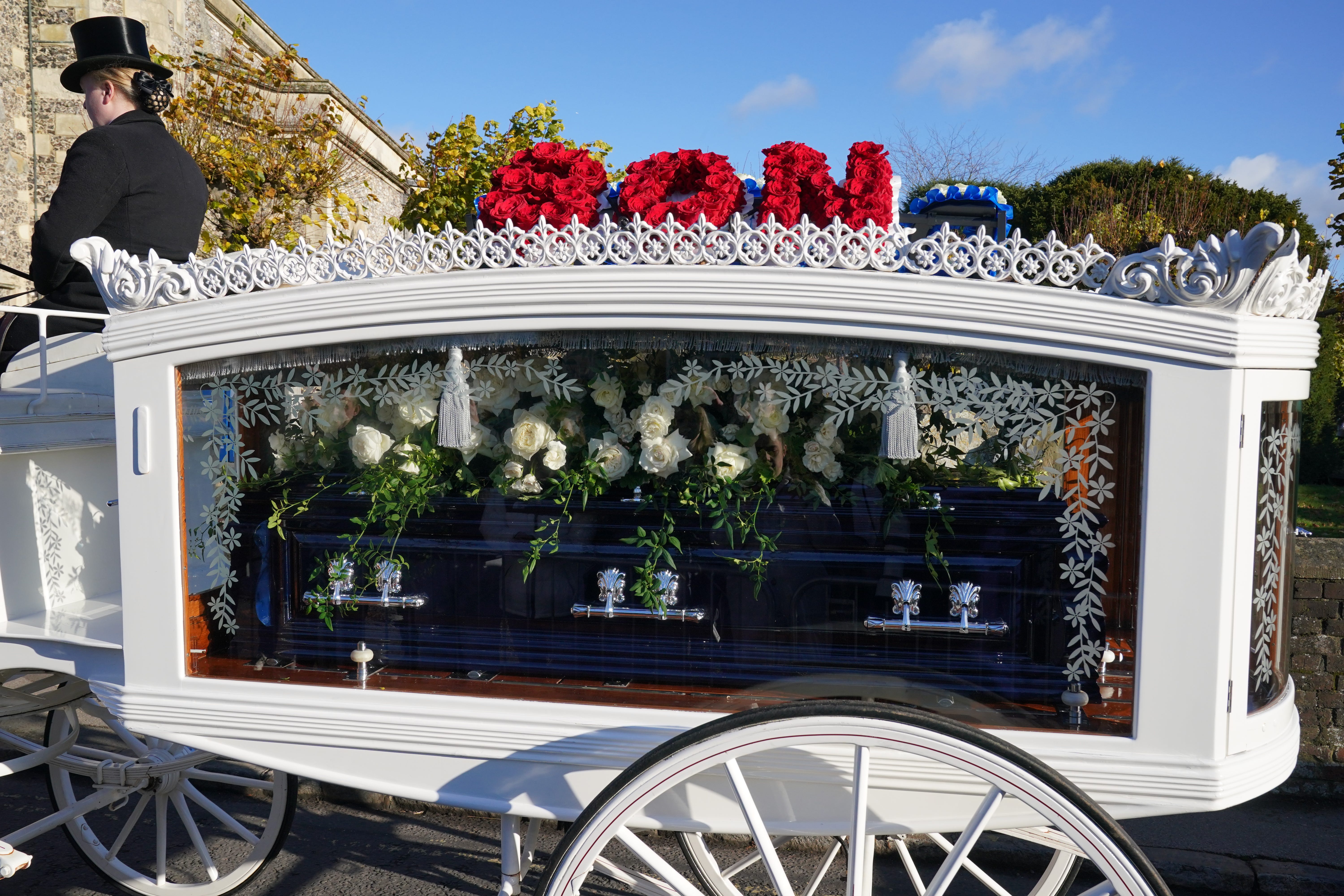 A horse-drawn carriage carrying the coffin of Liam Payne arrives for the funeral service of the One Direction singer at St Mary’s Church in Amersham, Buckinghamshire (Jonathan Brady/PA)