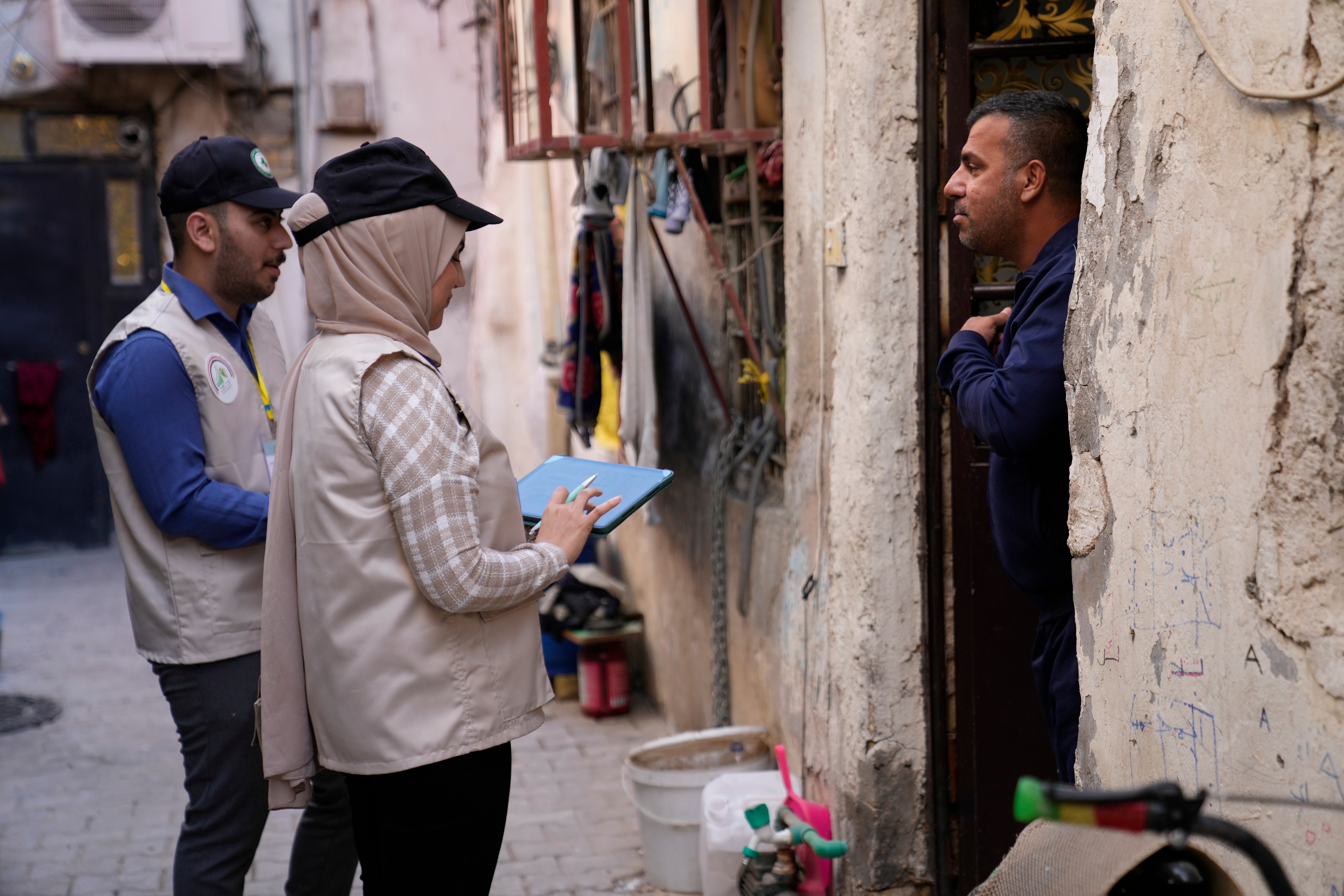 Workers prepare to collect information from the public as Iraq began its first nationwide population census in decades