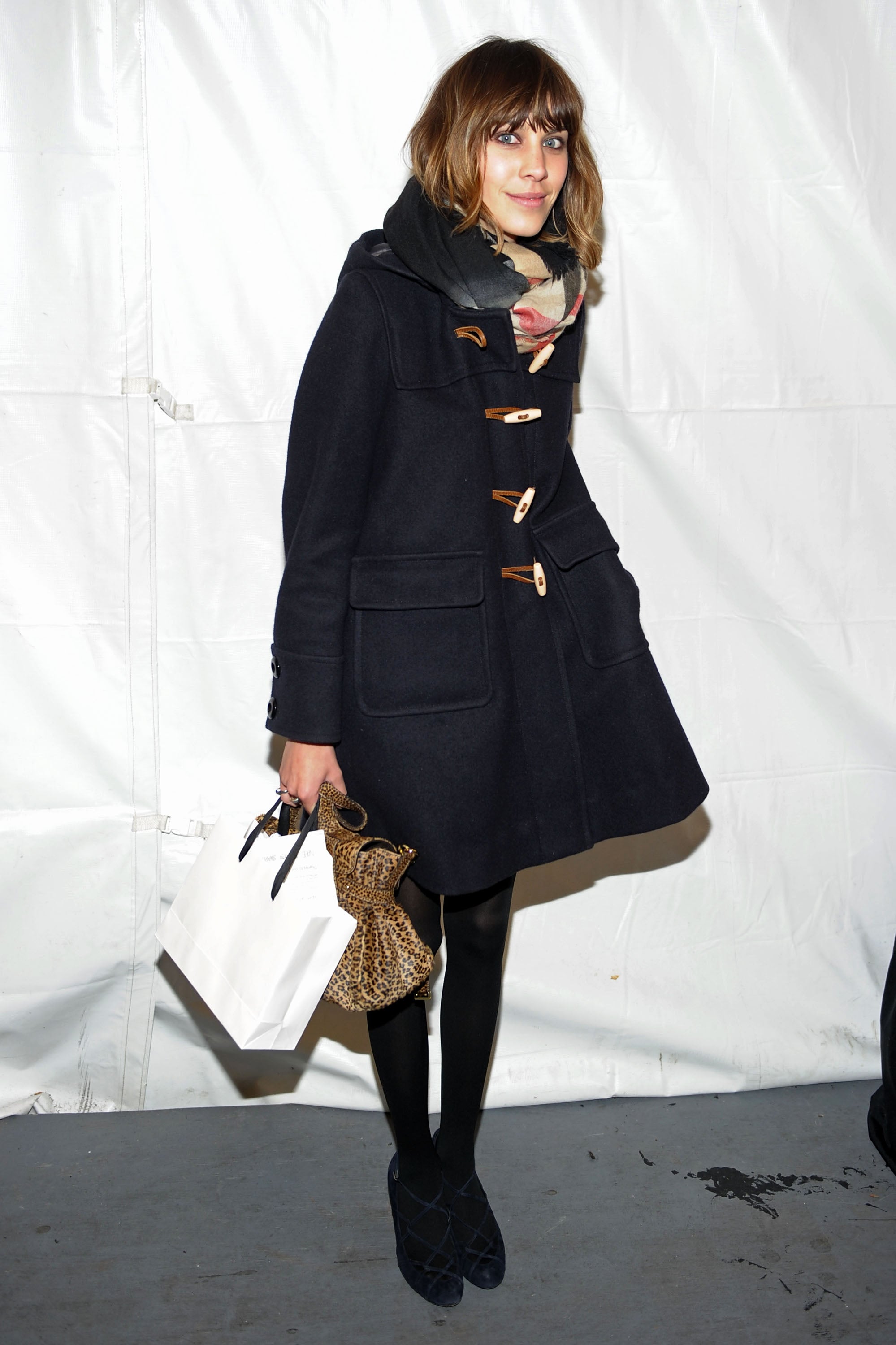 Model Alexa Chung wearing a duffle coat