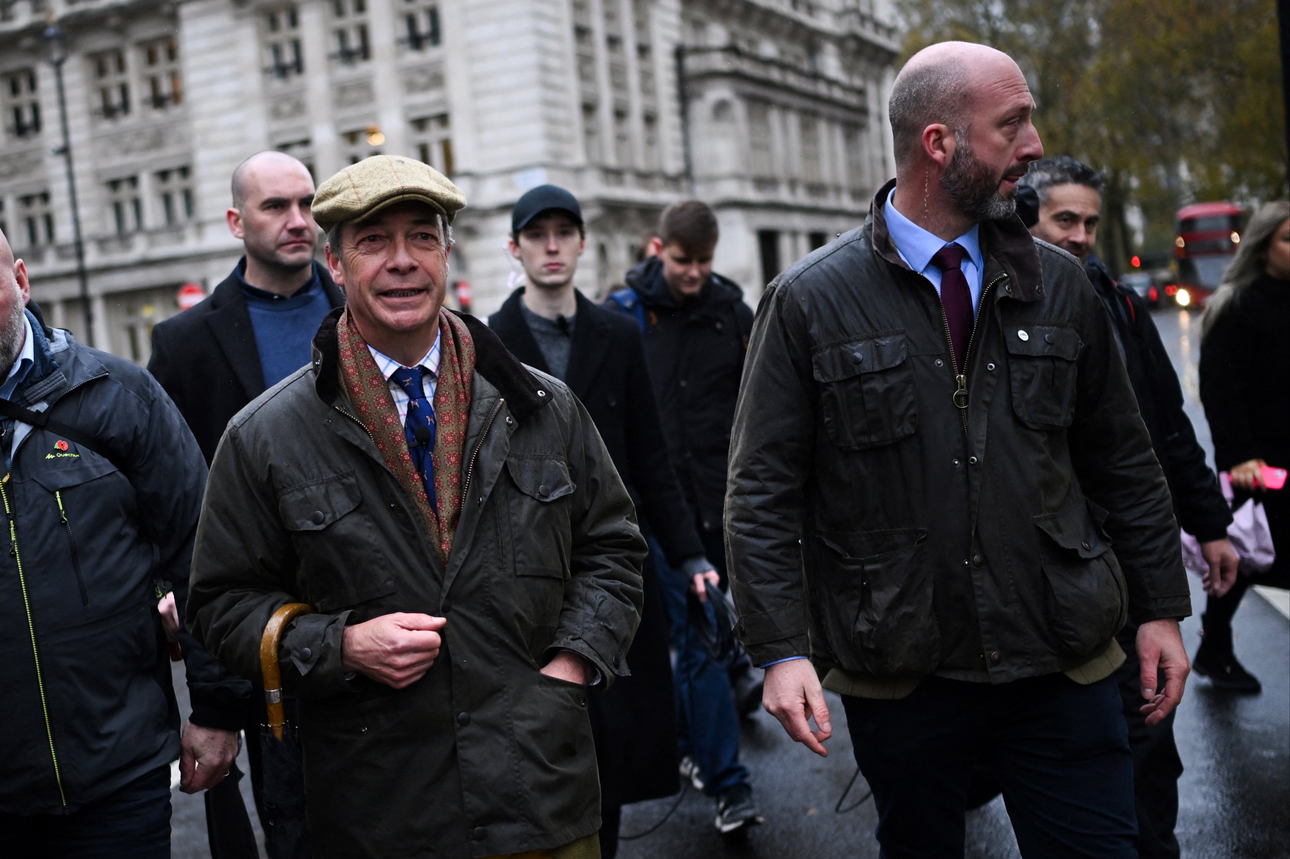 Reform UK leader Nigel Farage arrives to attend a farmers' protest against changes to inheritance tax rules for land ownership, outside of Downing Street, on Whitehall, in central London, on November 19, 2024.