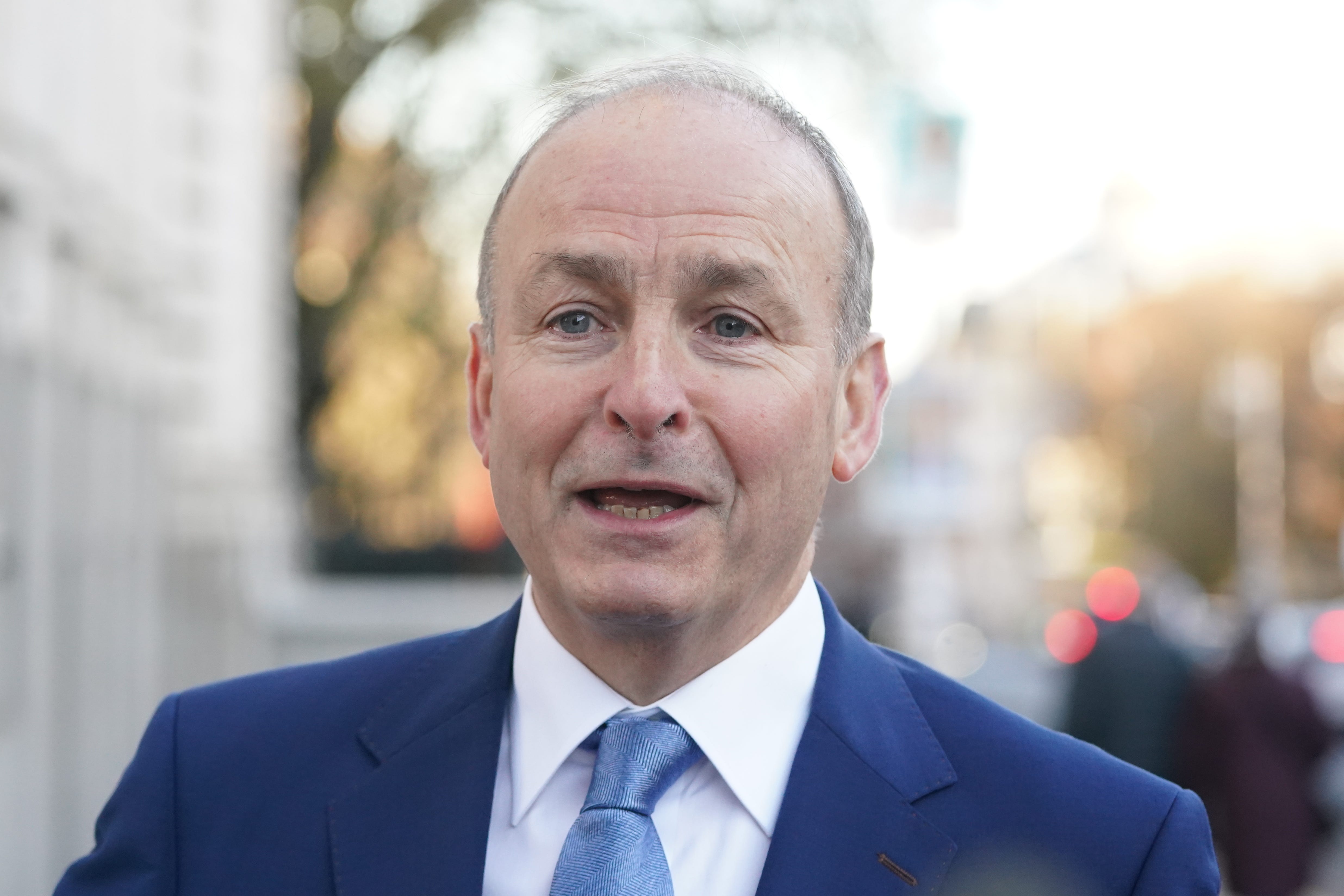 Tanaiste and Fianna Fail Leader Micheal Martin speaking to the media as he arrives at Government Buildings, Dublin, to attend Cabinet (Brian Lawless/PA)