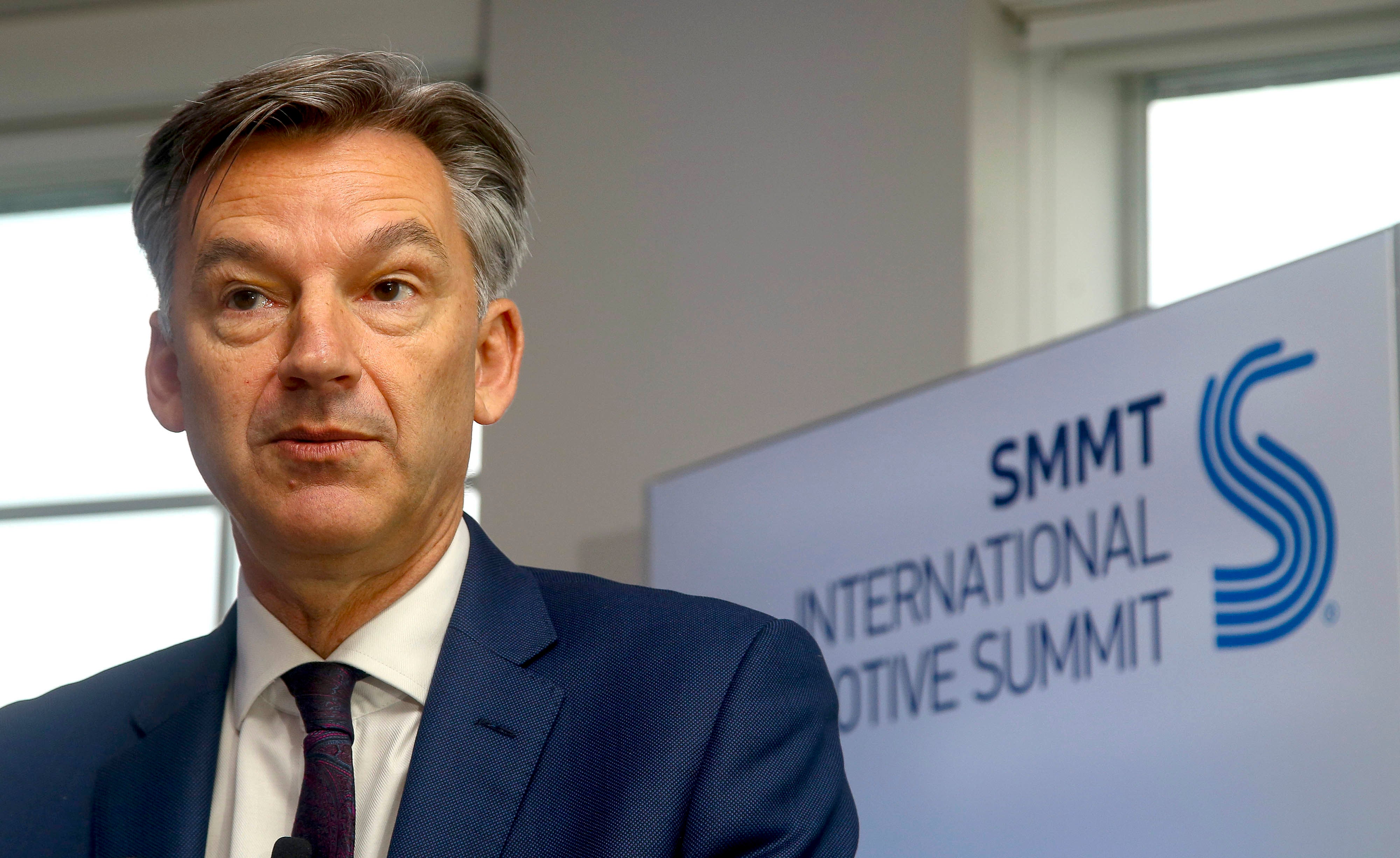 Mike Hawes, CEO of SMMT, is calling for a halving of VAT on EVs to boost demand