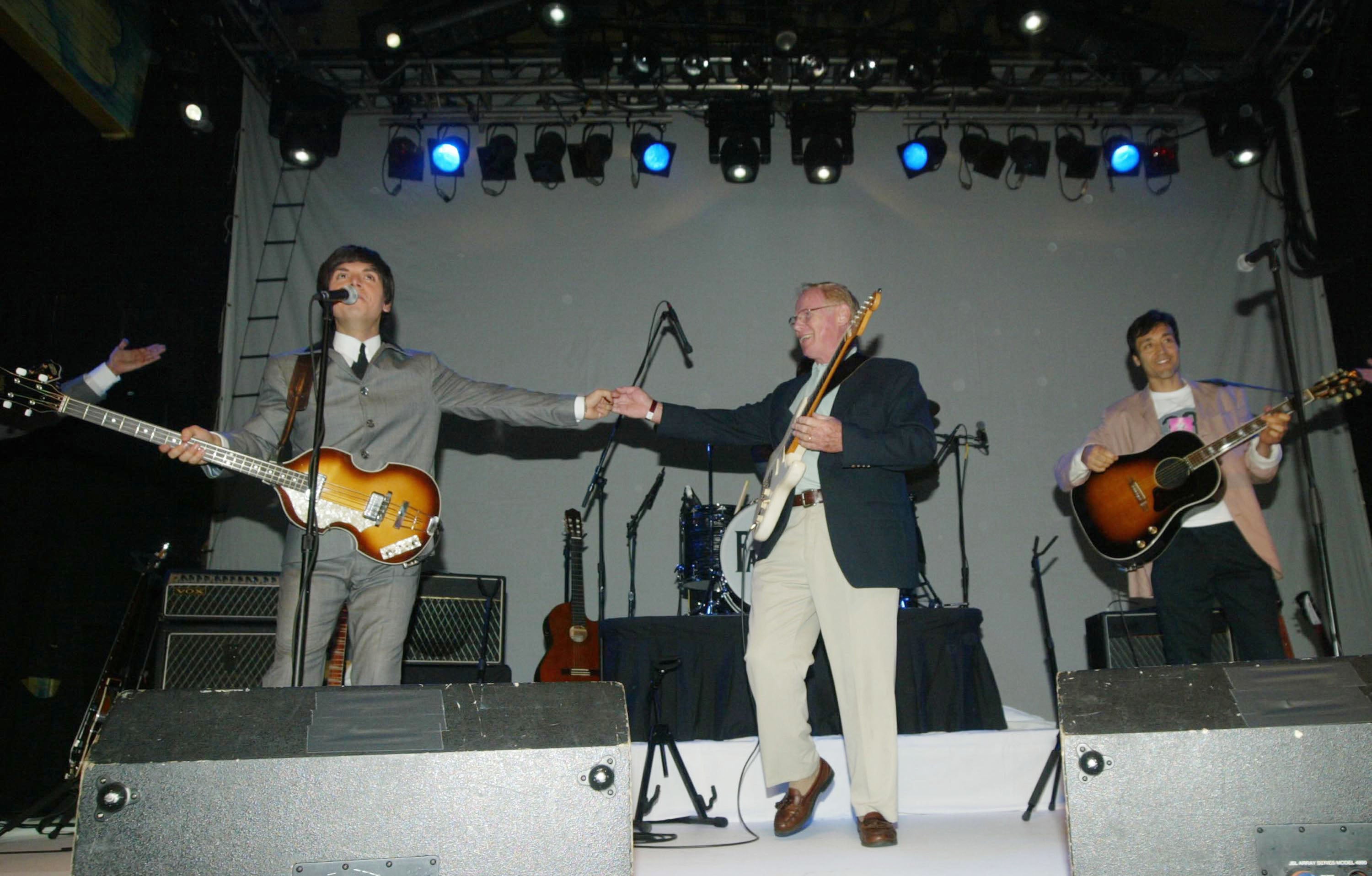 Vic Flick performs with tribute band The Fab Four at the House of Blues club on 1 October 2002