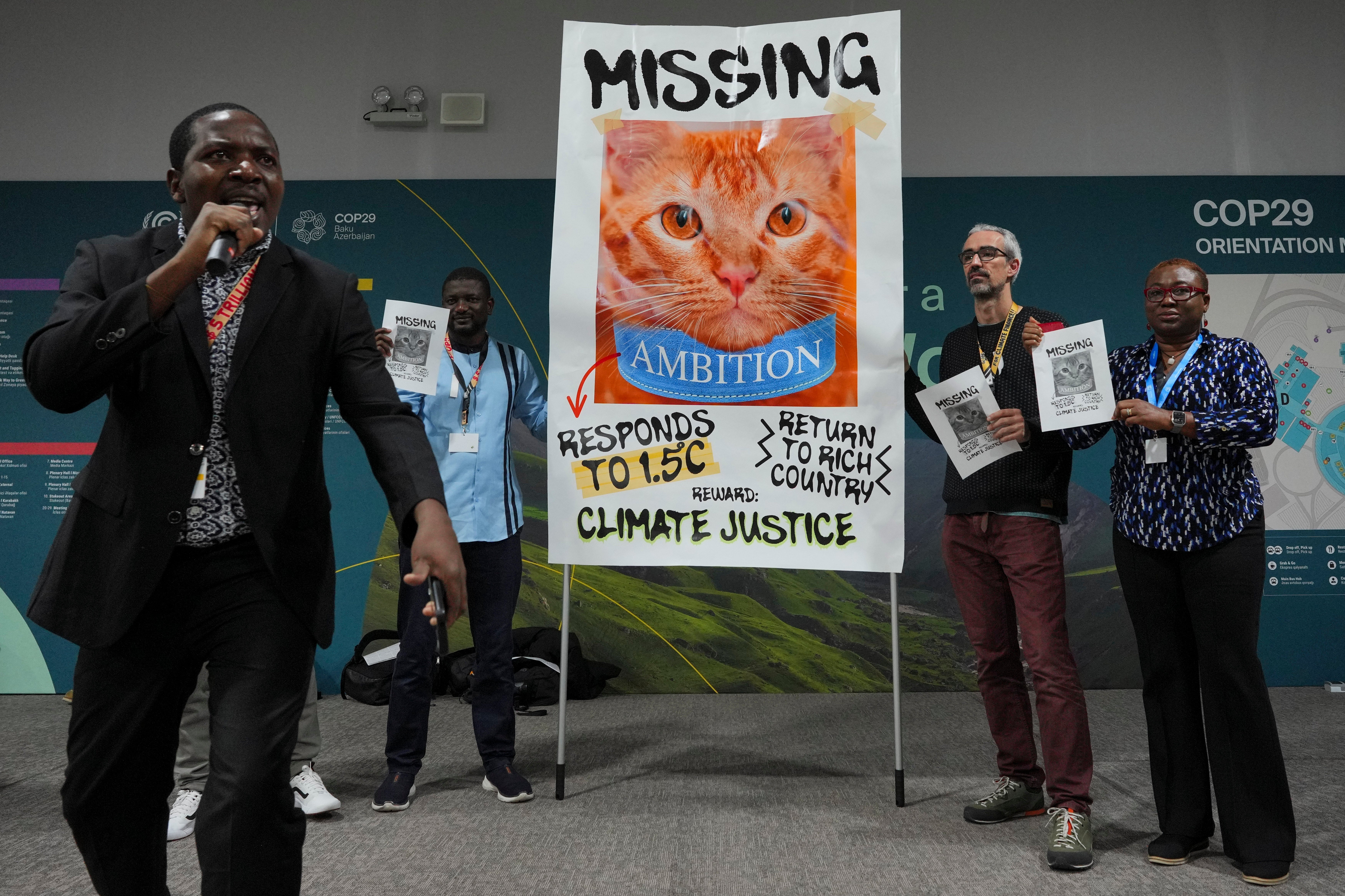 Activists participate in a demonstration for climate justice at the Cop29 Climate Summit