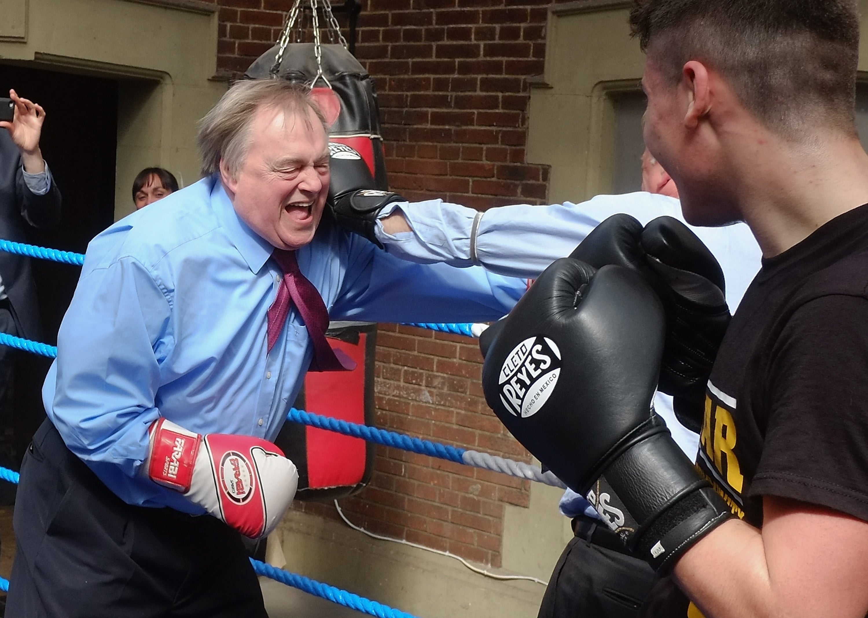 Prescott spars with journalist Michael Crick during a visit to a boxing club in Redcar in 2015