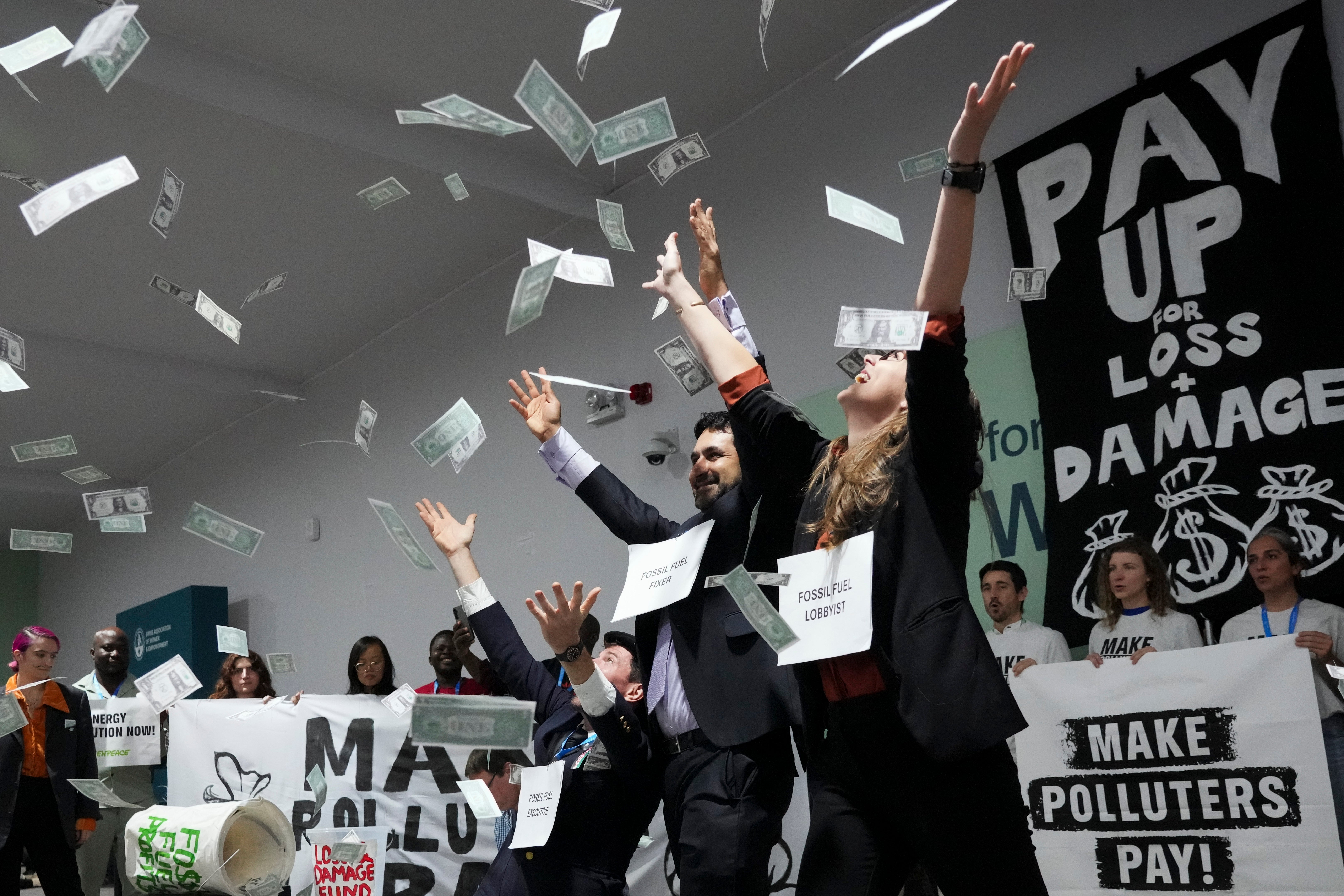 Activists participate in a demonstration for climate finance at the Cop29 UN climate summit (Sergei Grits/AP)