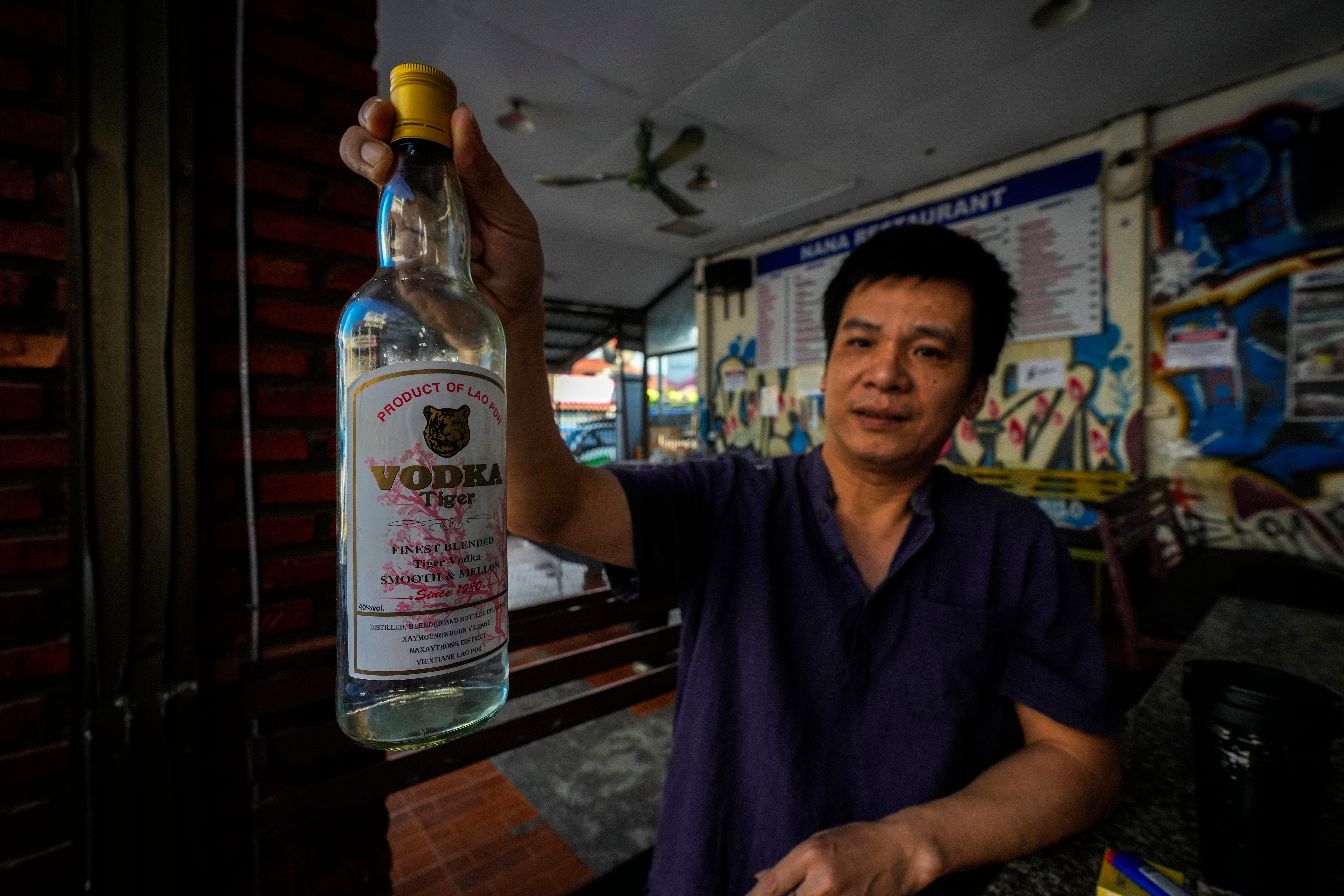 Duong Duc Toan, the manager of Nana Backpacker hostel, says alcohol served from the hostel’s bar is from a certified distributor