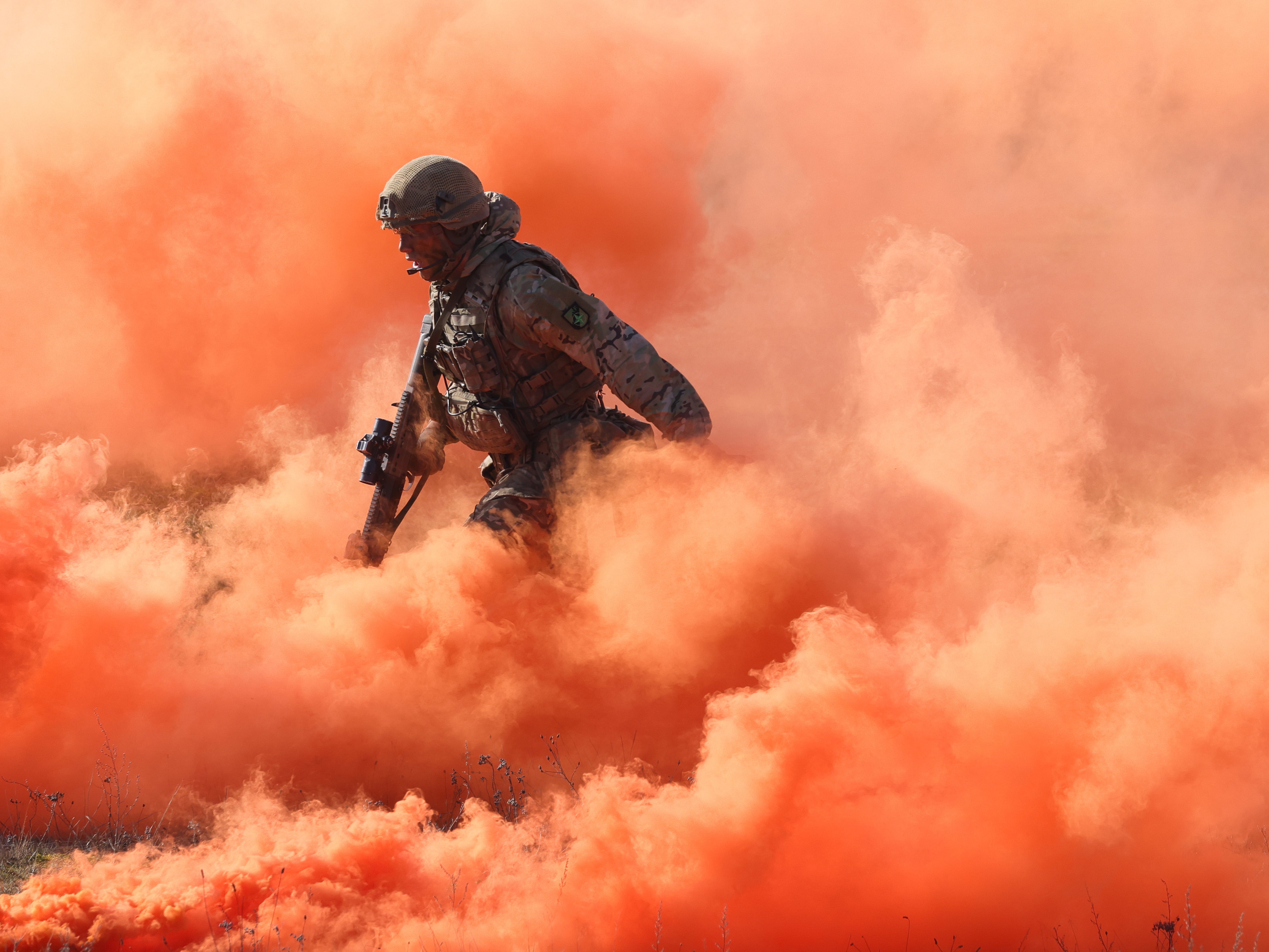 A soldier of the UK’s 2nd Battalion Royal Anglian infantry takes part in a simulated attack in Poland