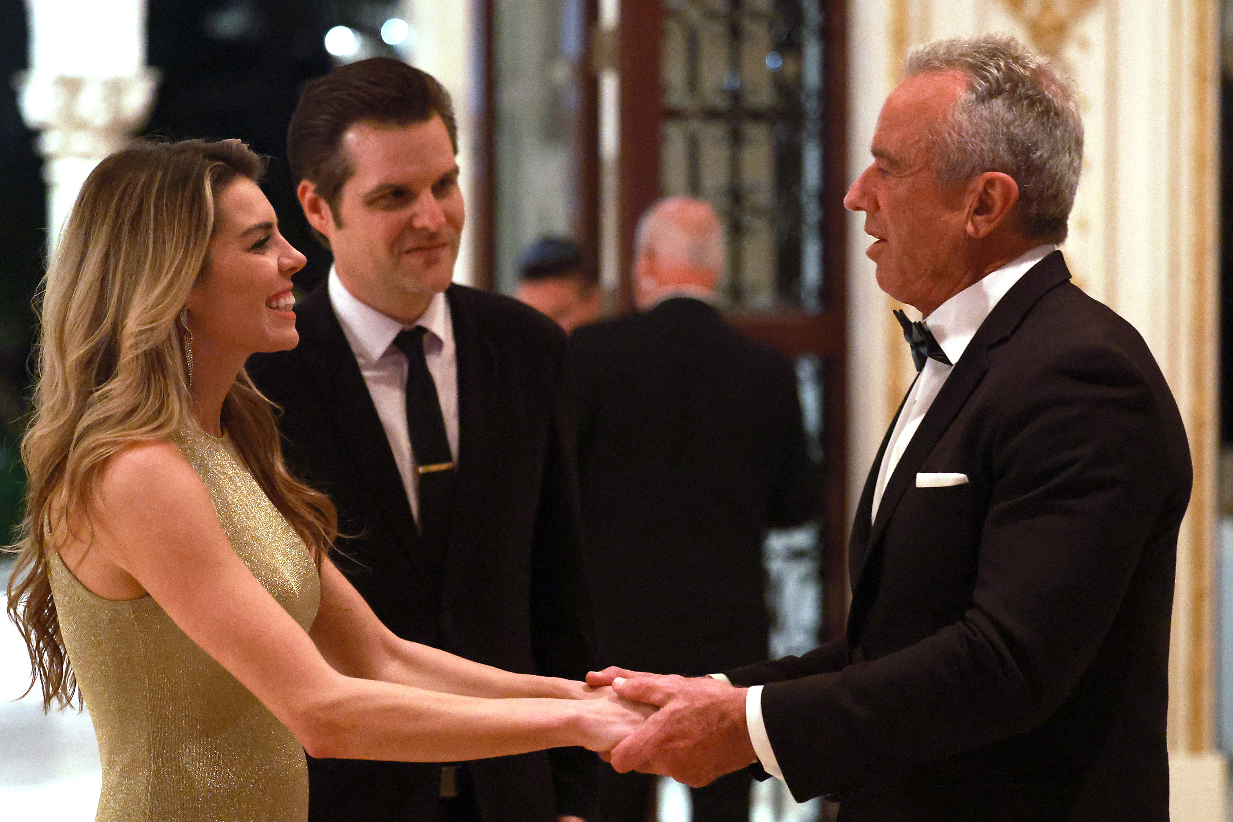 Matt Gaetz, Ginger Gaetz and Robert F. Kennedy Jr. at The America First Policy Institute Gala at Mar-A-Lago last week