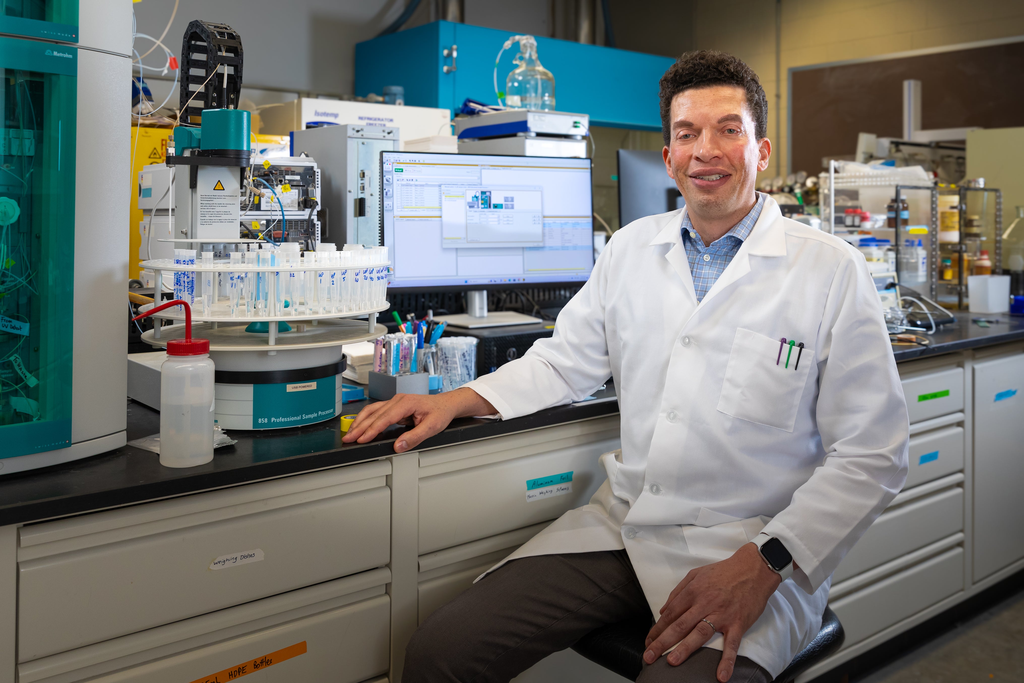 Julian Fairey, an associate professor of civil engineering at the University of Arkansas, sits in his lab. Fairey has been working on this research for years