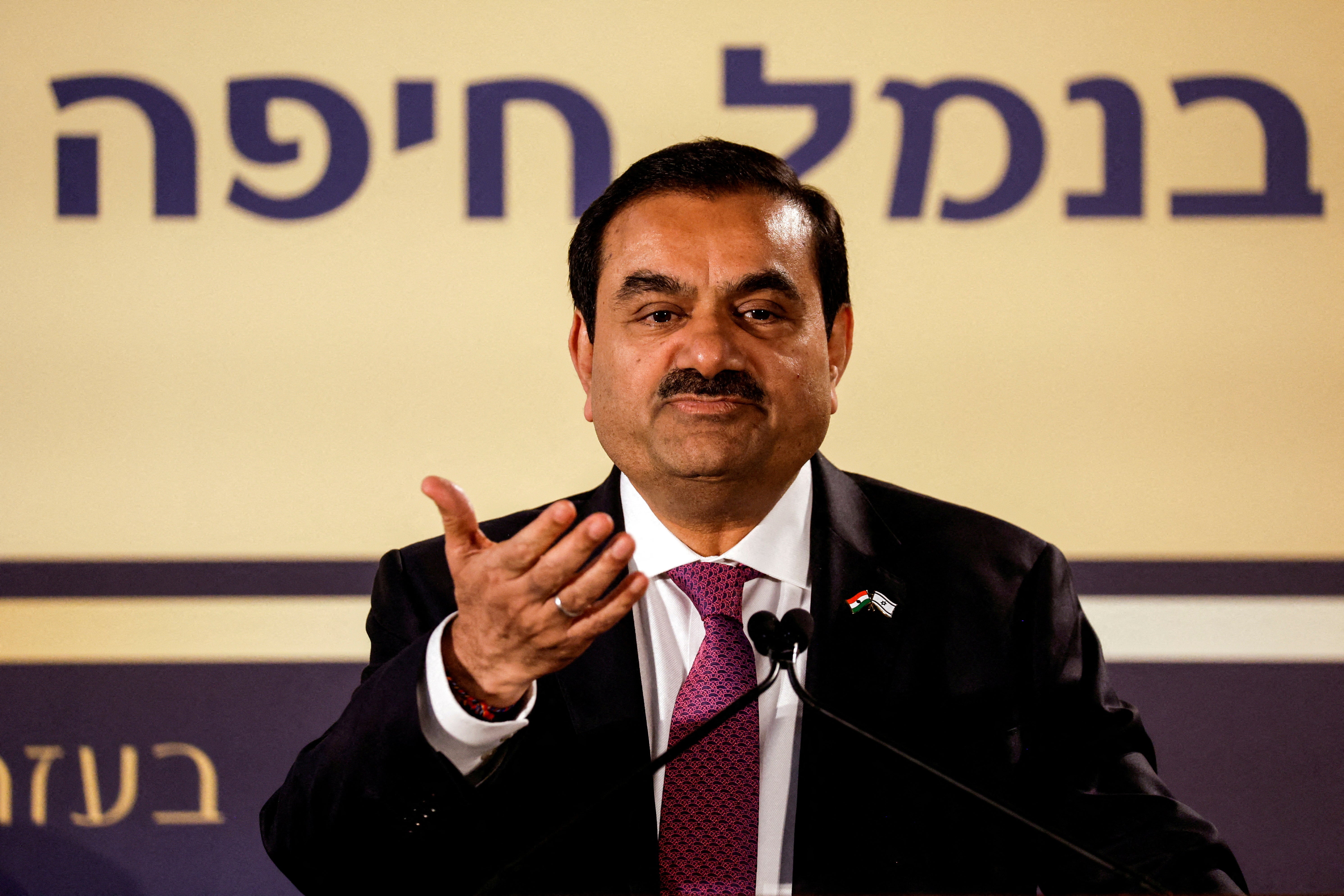 Indian billionaire Gautam Adani speaks during an inauguration ceremony after the Adani Group completed the purchase of Haifa Port earlier in January 2023