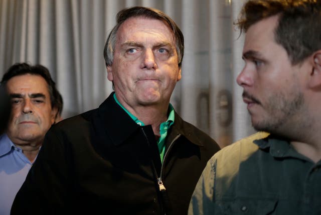 <p>Brazil’s former President Jair Bolsonaro prepares to speak to the press in Belo Horizonte, Brazil, 30 June 2023</p>