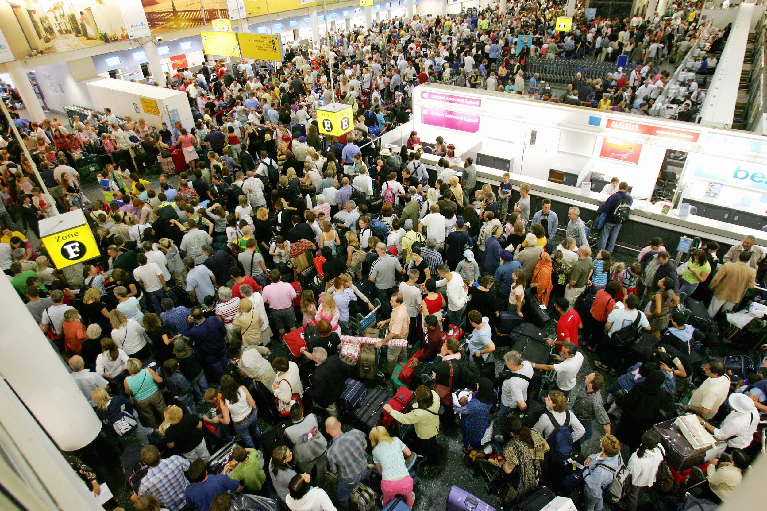 Crowds of passengers gather at Gatwick Airport