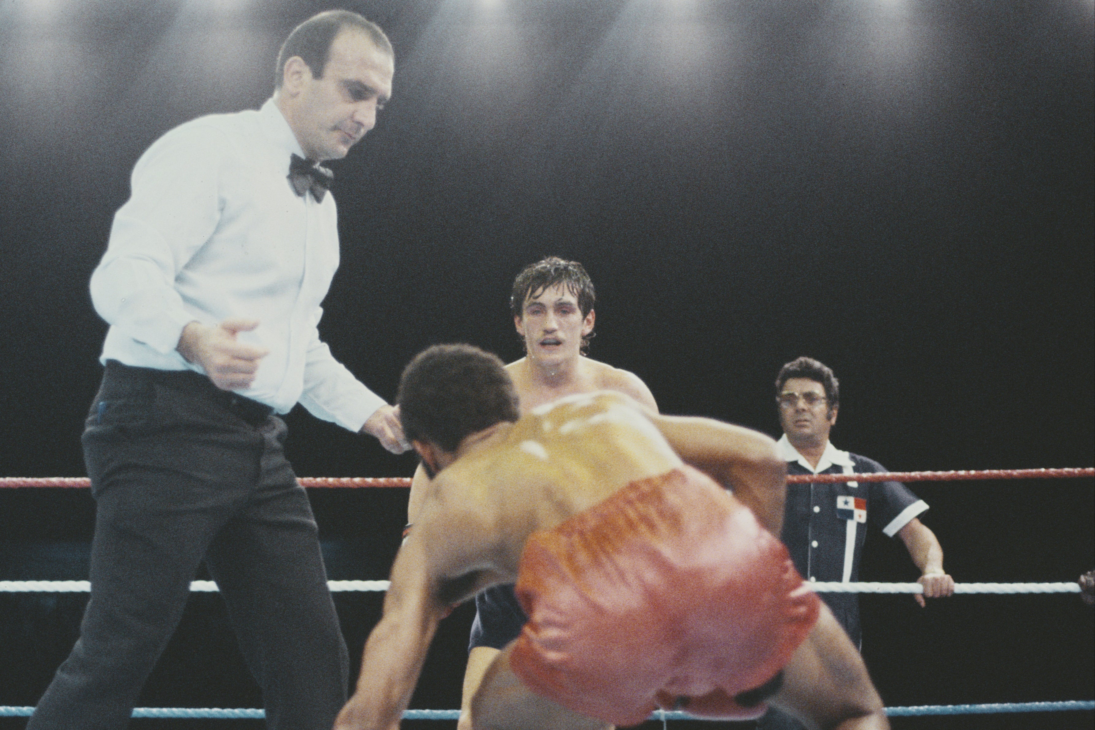 McGuigan (centre) during his win over Eusebio Pedroza in 1985