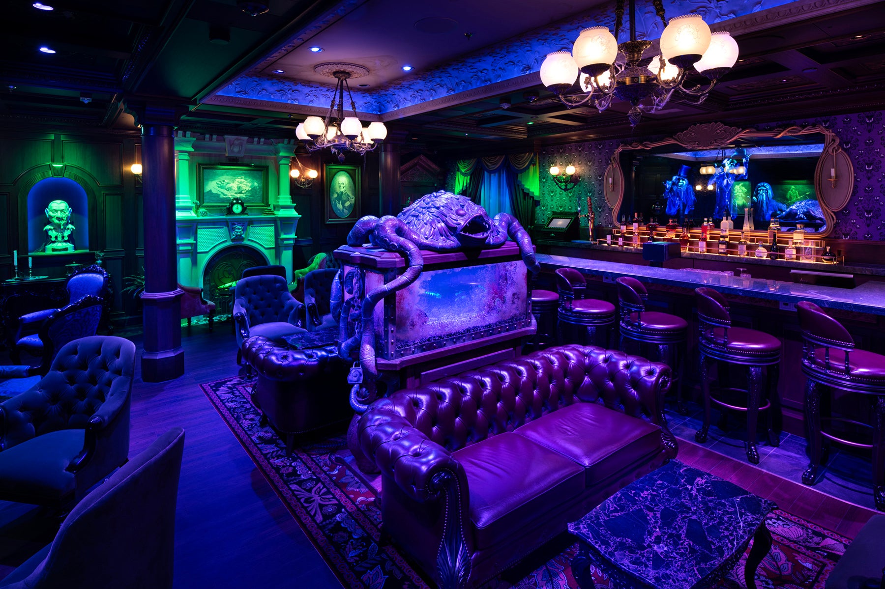 Enjoy spooktacular specialty cocktails in the Haunted Mansion Parlor