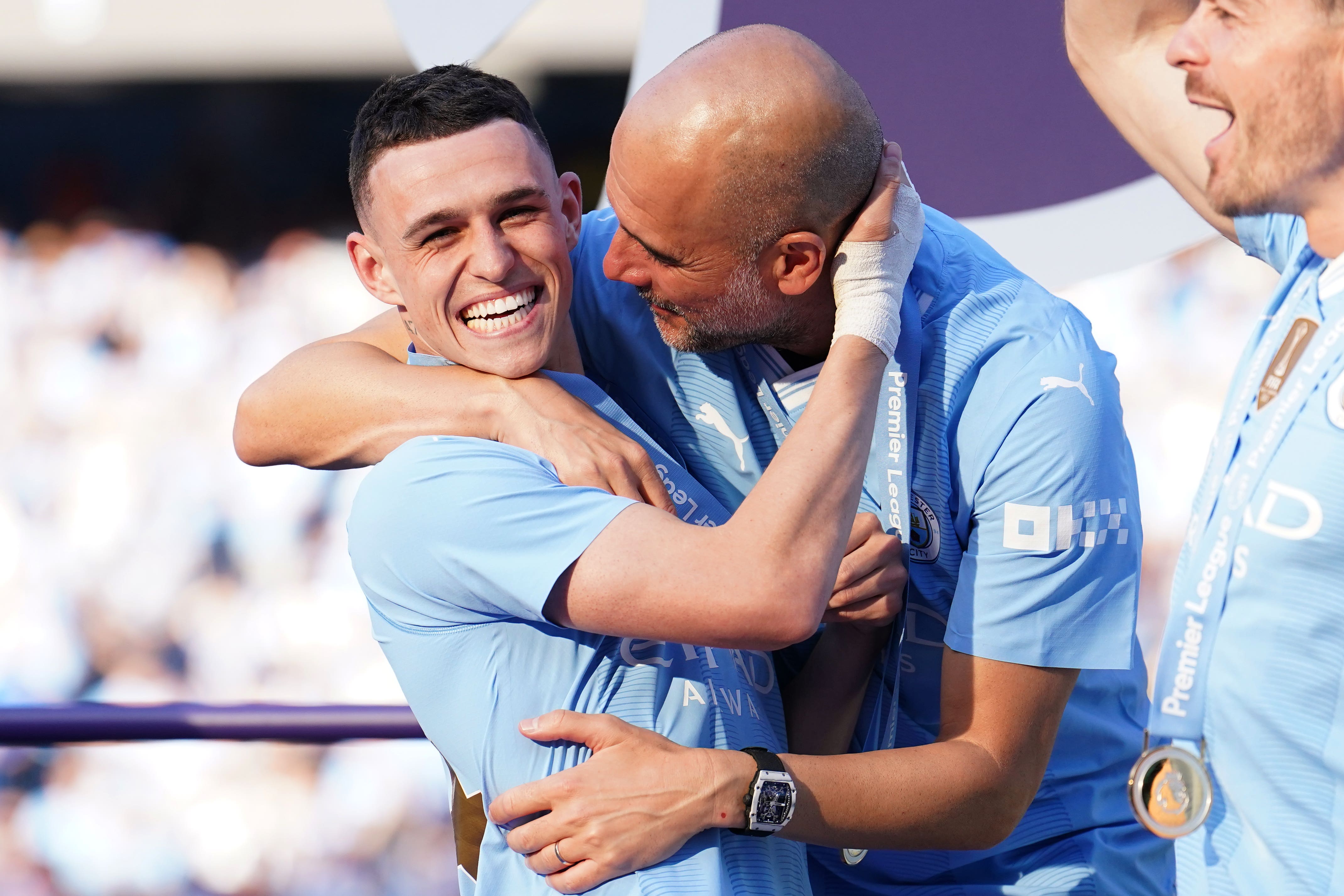 Pep Guardiola celebrating with Phil Foden (Martin Rickett/PA)