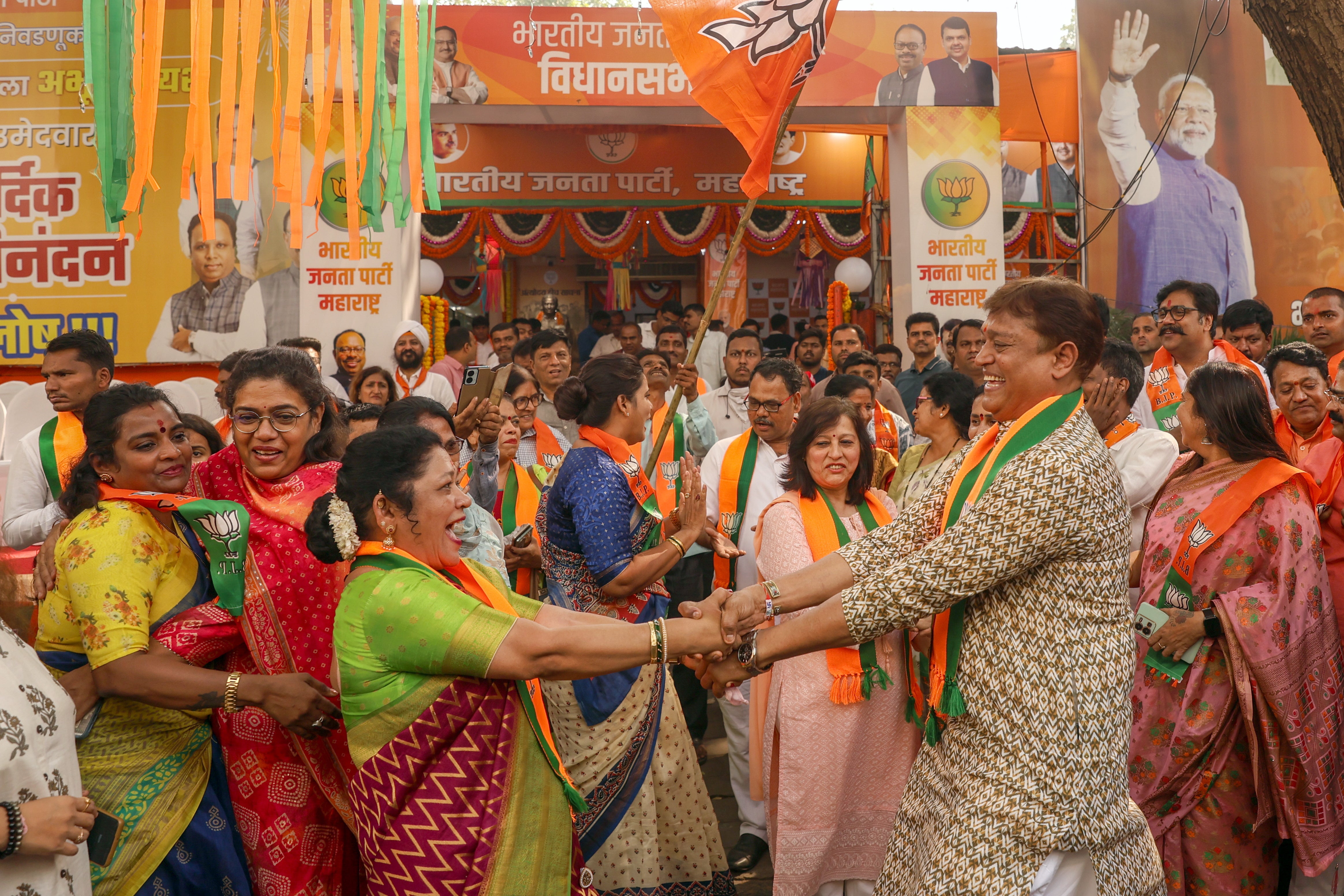 BJP supporters in Mumbai celebrate the Maharashtra result