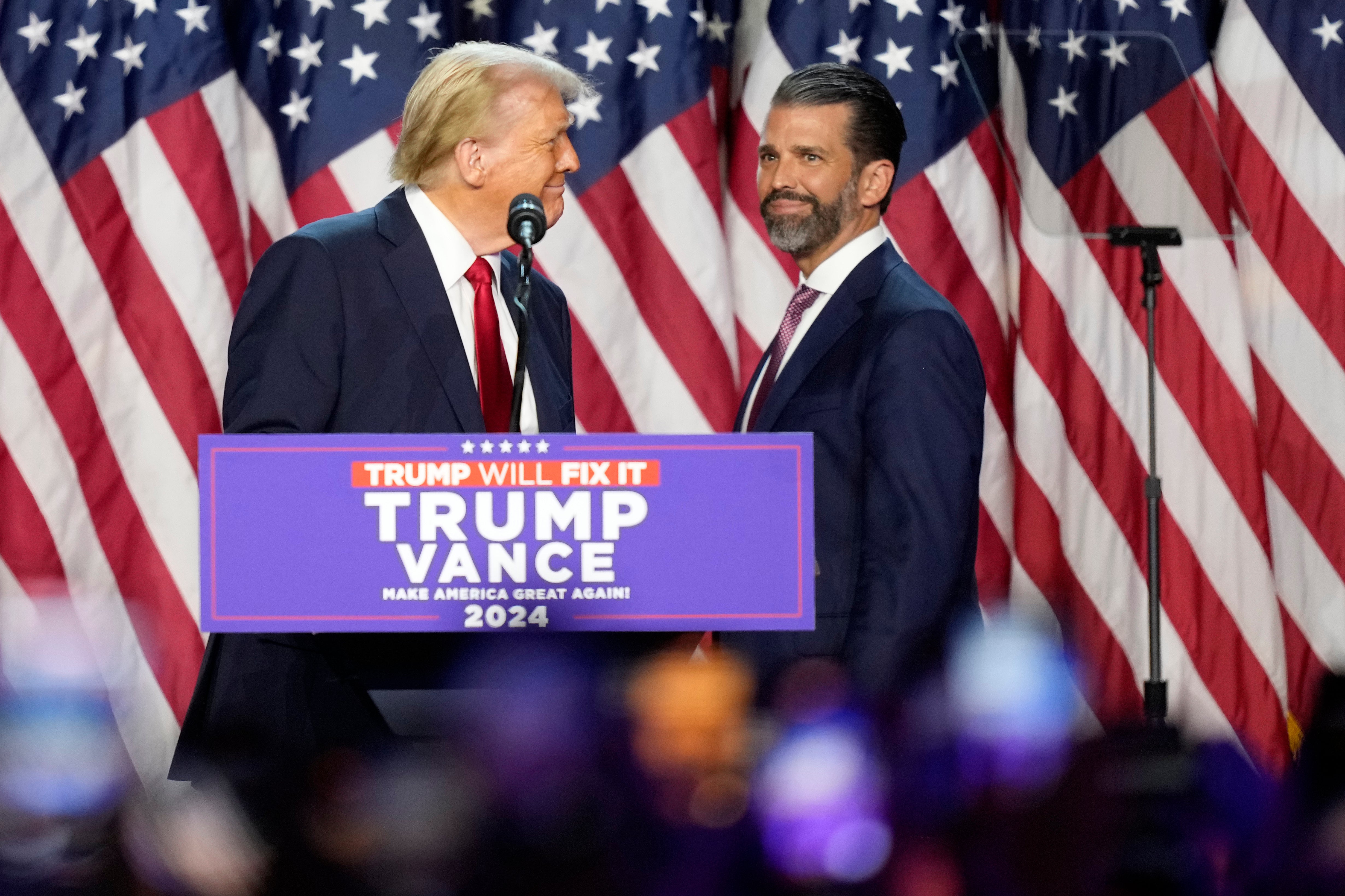 President-elect Donald Trump and his son Donald Trump Jr at the election night watch party in Florida. Don Jr has emerged as the biggest familial influence during the transition