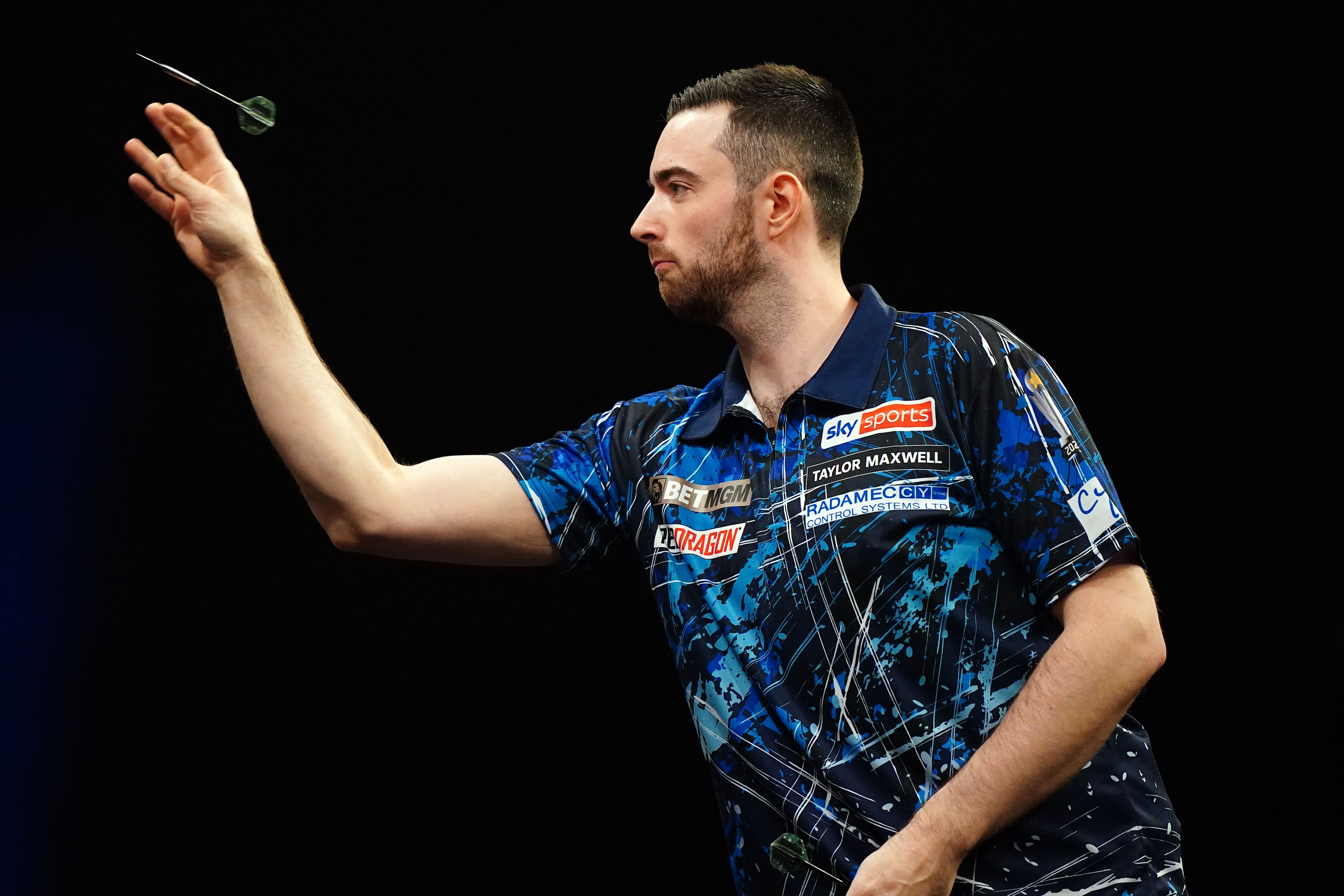 Luke Humphries (pictured) defeated Luke Littler 11-7 to retain his Players Championship Finals title in Minehead (Zac Goodwin/PA)