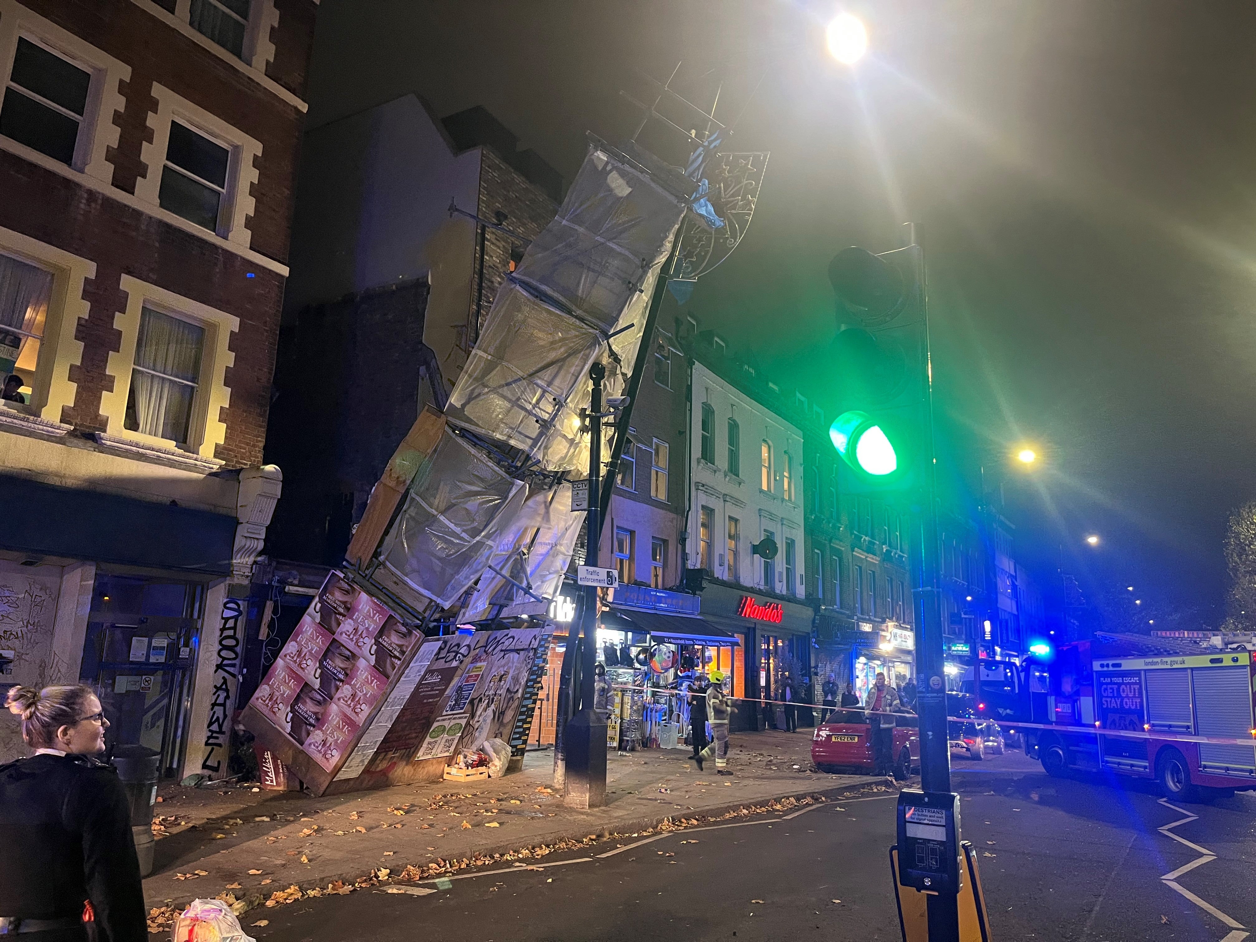 Emergency services at the scene of a scaffolding collapse on Bethnal Green Road, London, 24 November