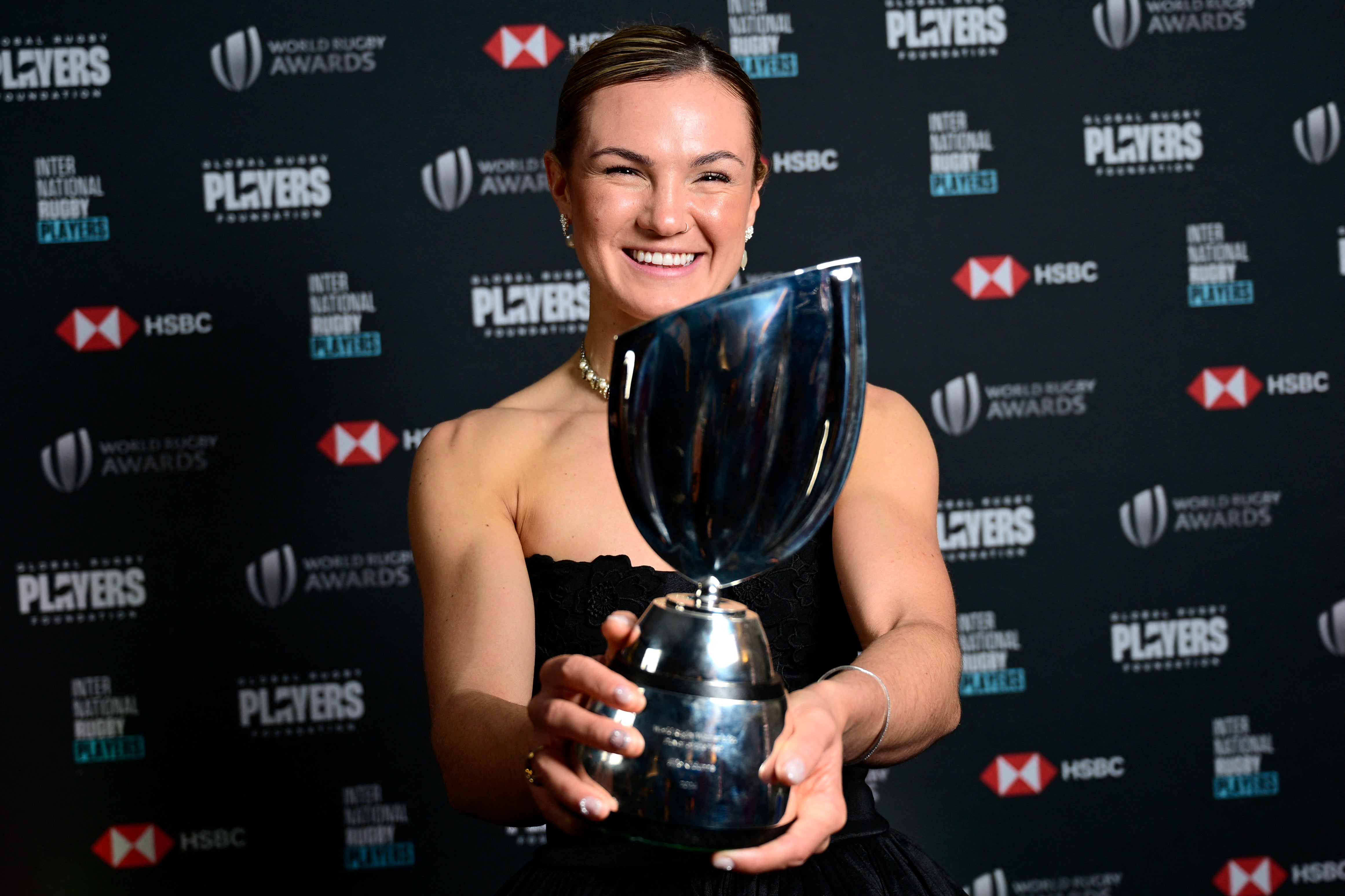 England's Ellie Kildunne poses with the trophy