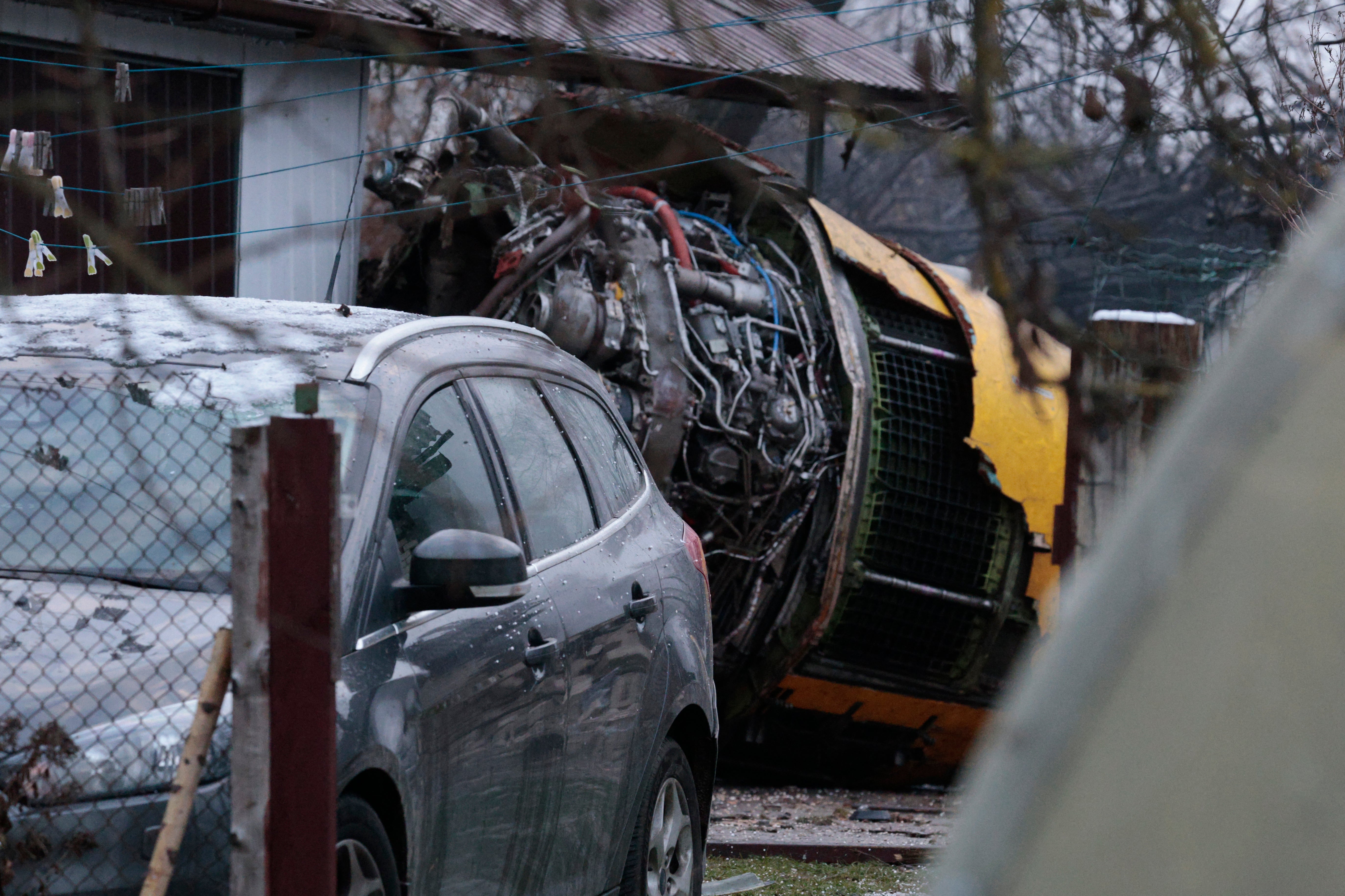 Plane wreckage could be seen in the courtyard of a house near Vilnius airport