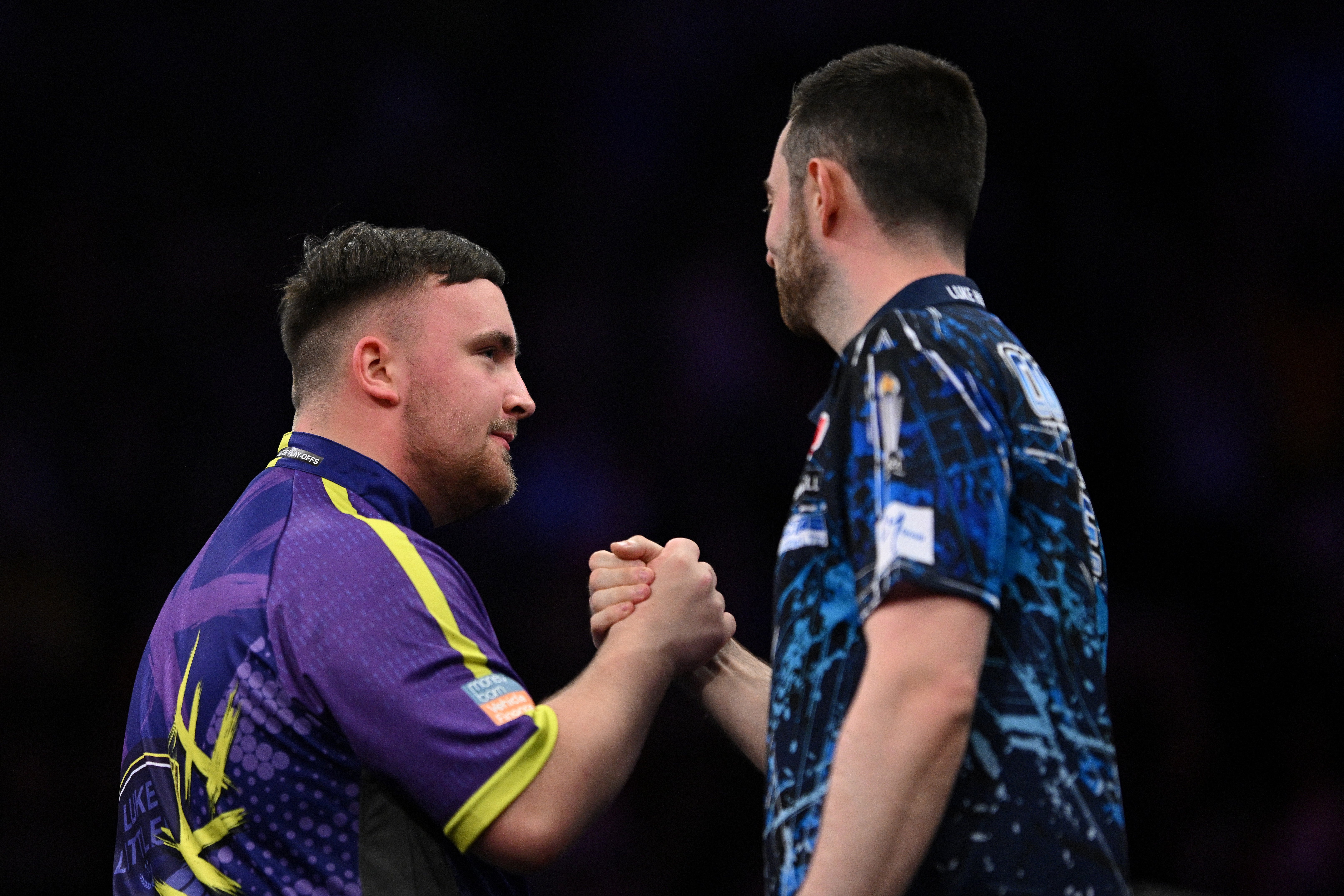 Luke Littler of England celebrates after a nine dart finish against Luke Humphries in the Premier League Darts Play-Offs