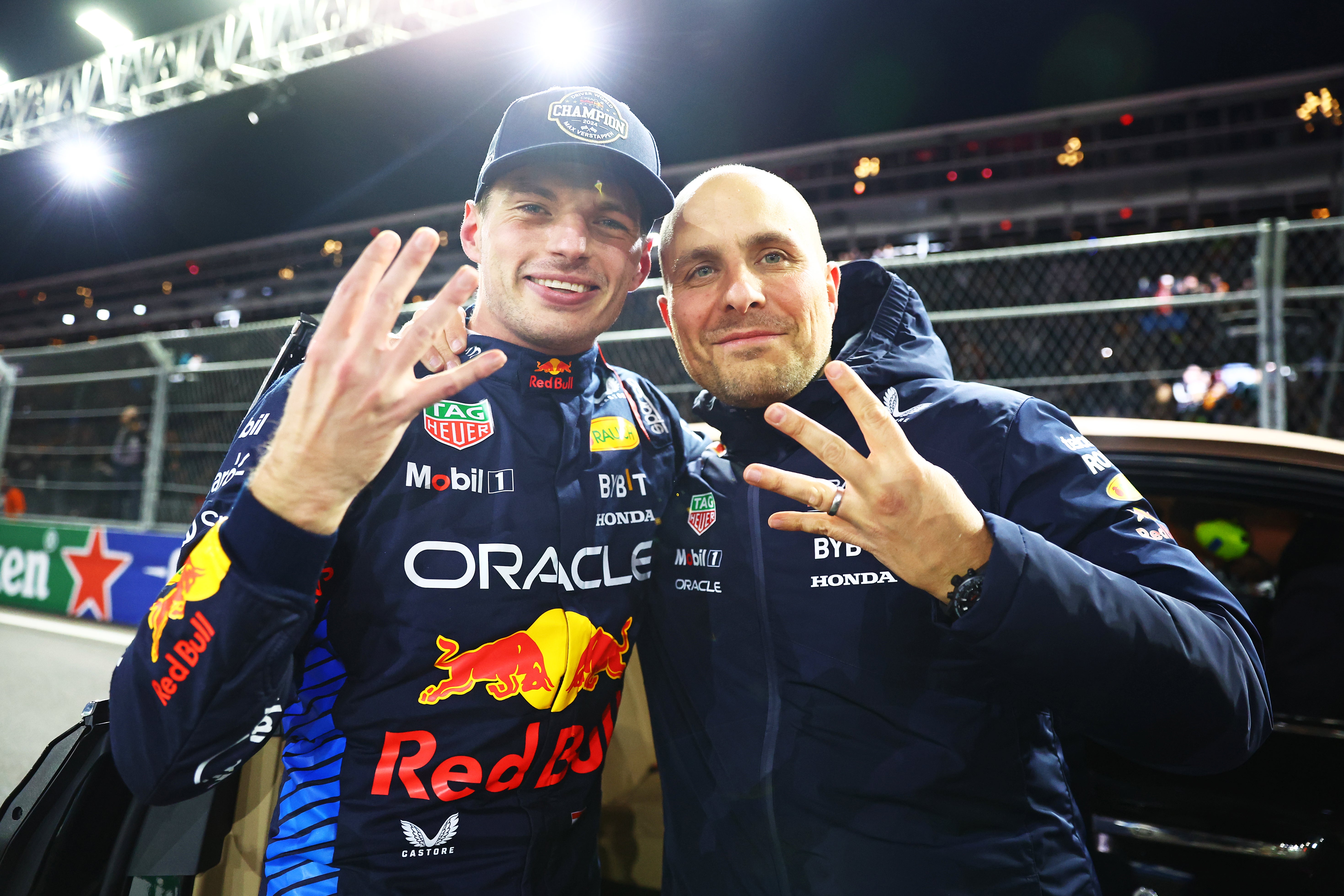 Max Verstappen alongside race engineer Gianpiero Lambiase after sealing his fourth F1 world championship