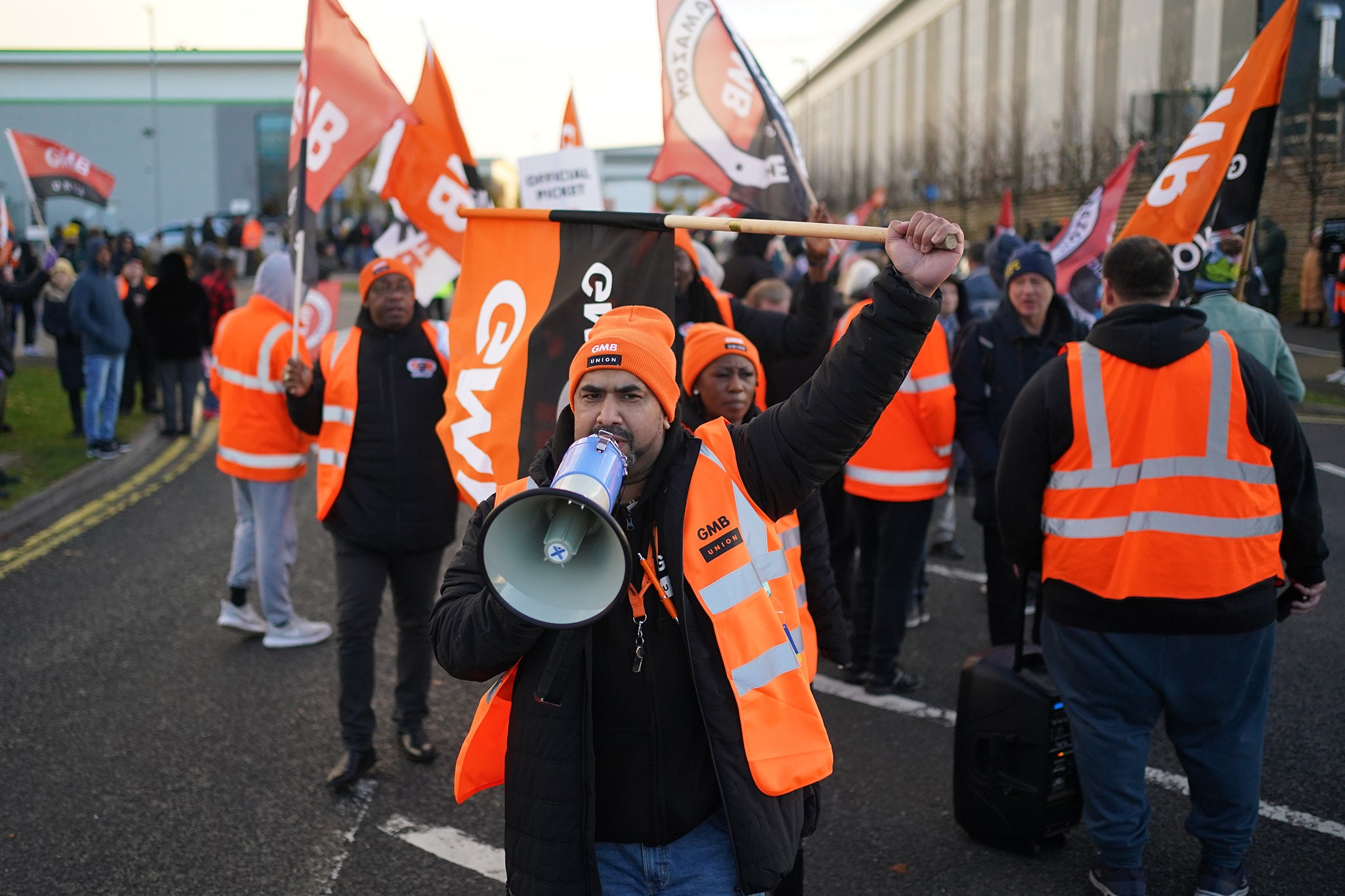 GMB union members picket outside the Amazon fulfilment centre in Coventry last year