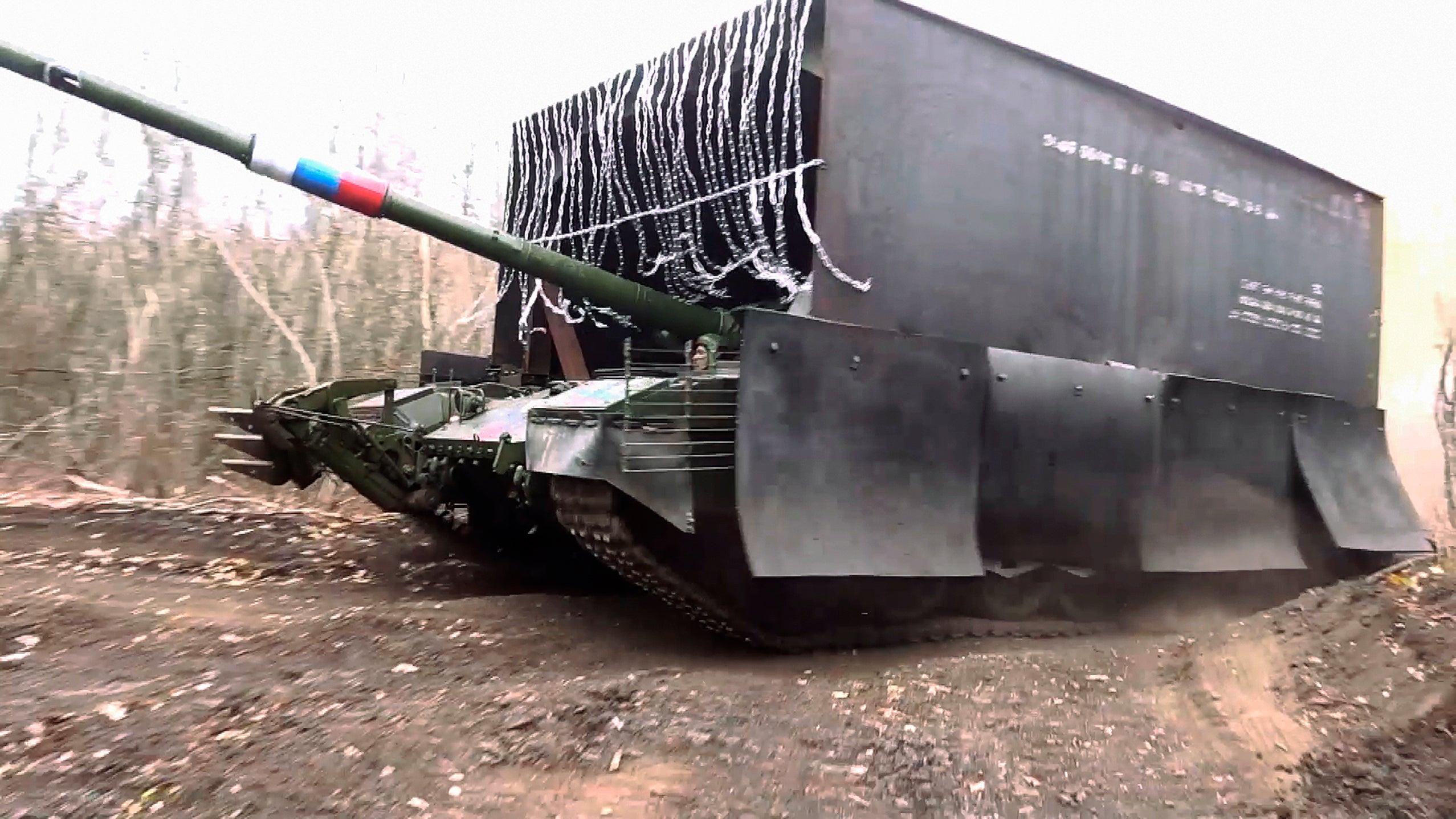 A Russian T-80 tank rolls in the Donetsk region in Ukraine on Tuesday