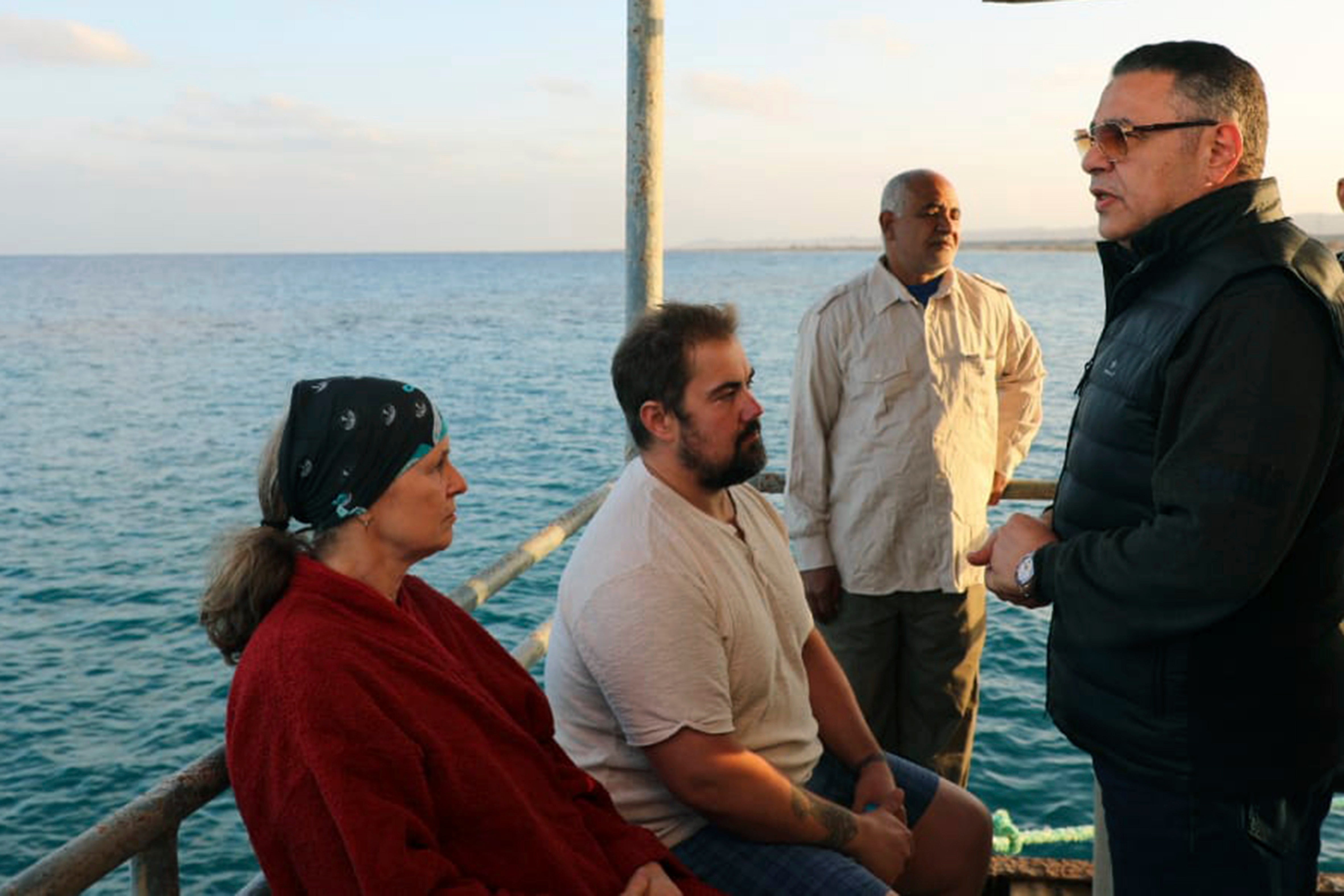 Amr Hanafi, the Red Sea Governor, speaks to survivors (Egyptian Press Centre/AP)