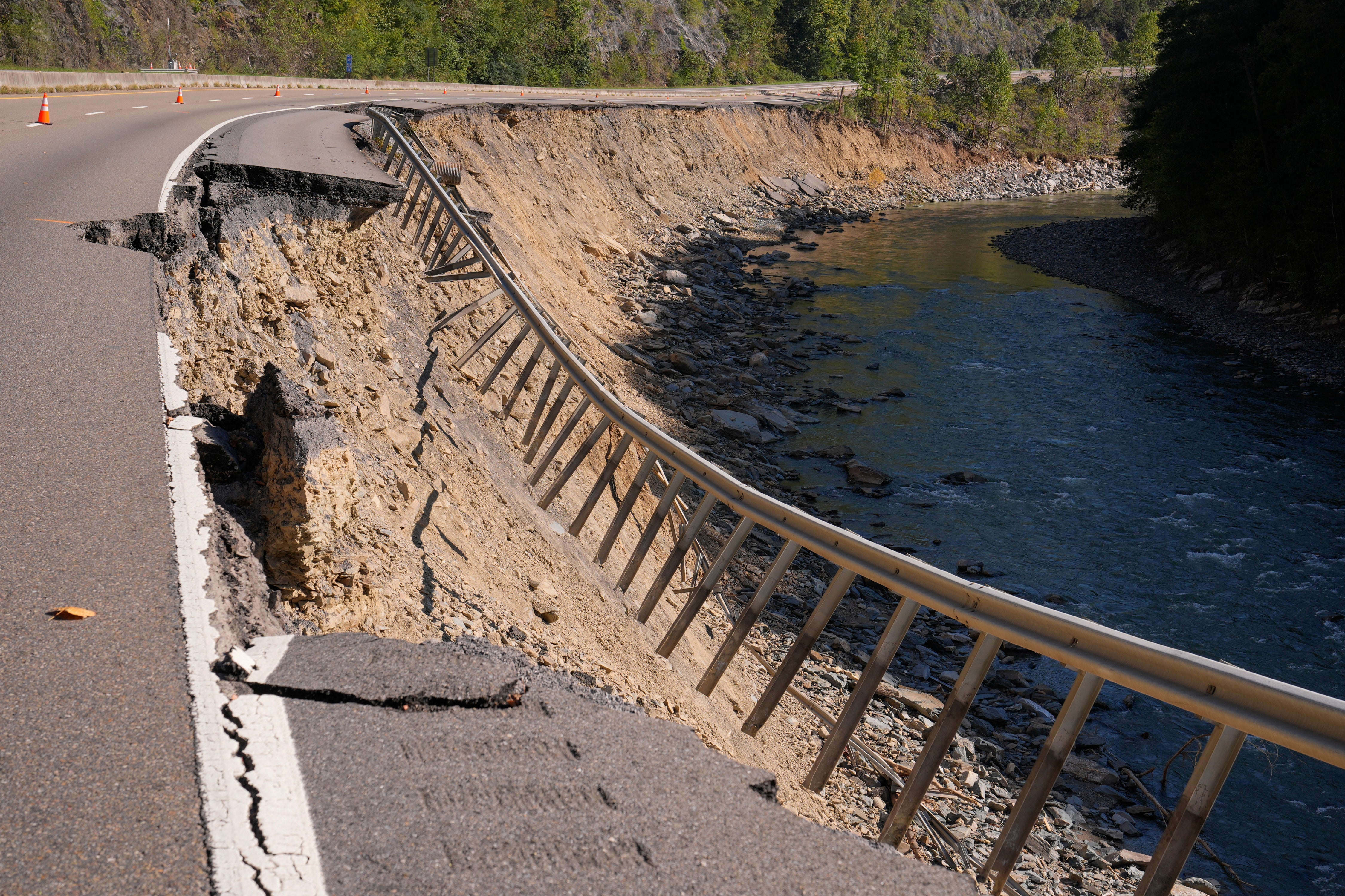 Damage from Hurricane Helene flooding is seen last month along eastbound lanes of Interstate 40 near the North Carolina state line in Cocke County, Tennessee. The storm accounted for about $250 billion worth of damage and economic hardship