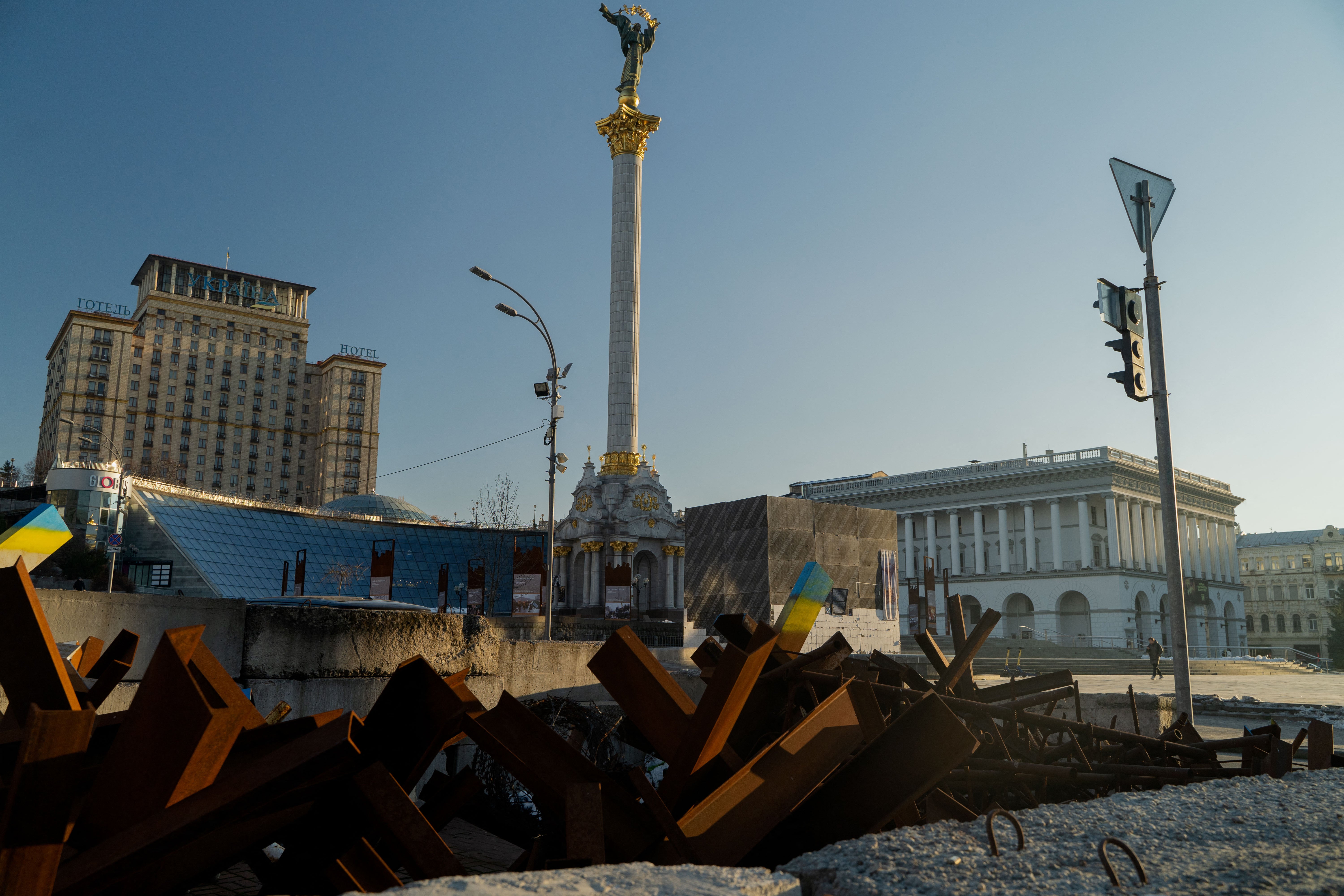 A pedestrian walks at the Independence Square in Kyiv