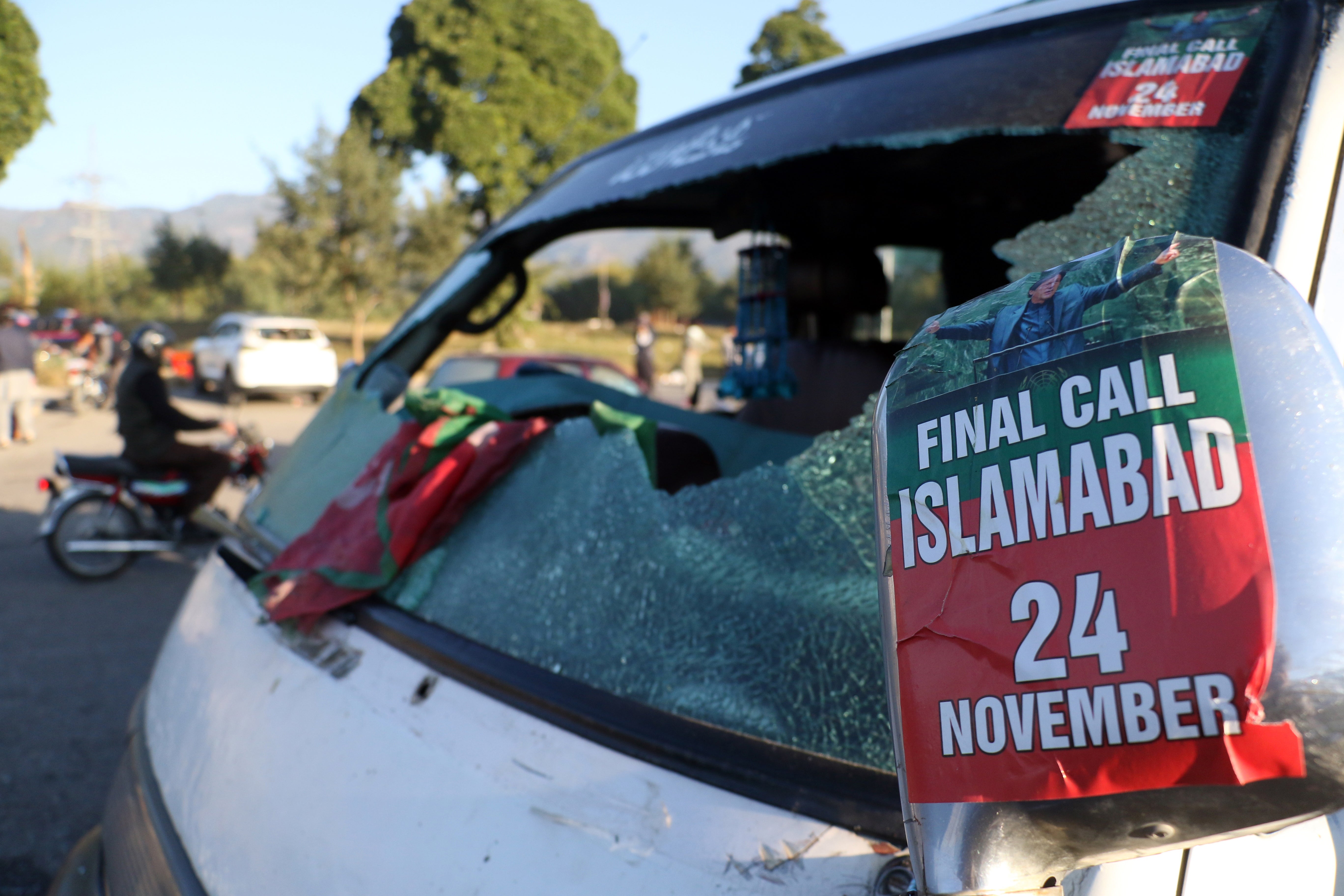 A view of a damaged vehicle after security forces launched operation to disperse the supporters of jailed former leader Imran Khan